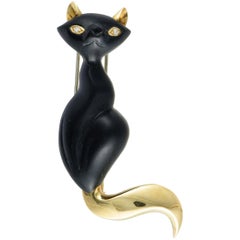 Dominique Arpels 18 Karat Yellow Gold 2 Diamond and Black Crystal Cat Brooch