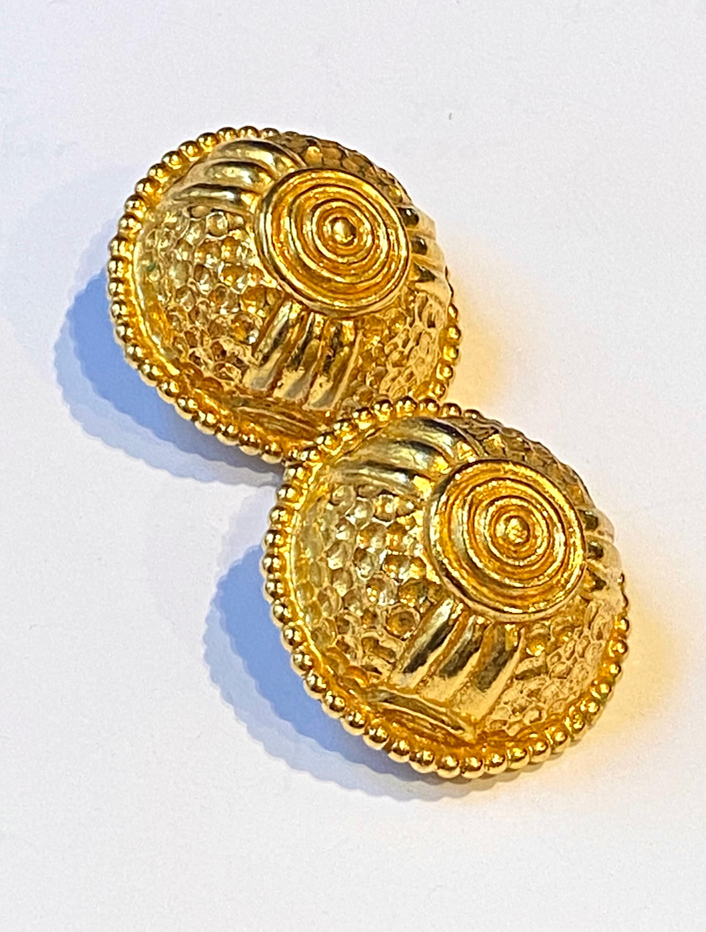 Presented is an amazing pair of 1980s large domed button earrings by French designer Dominique Aurientis. Beautifully cast and richly plated in 18K gold, the earrings nod to the Etruscan style. The earrings are intentionally irregular in its round