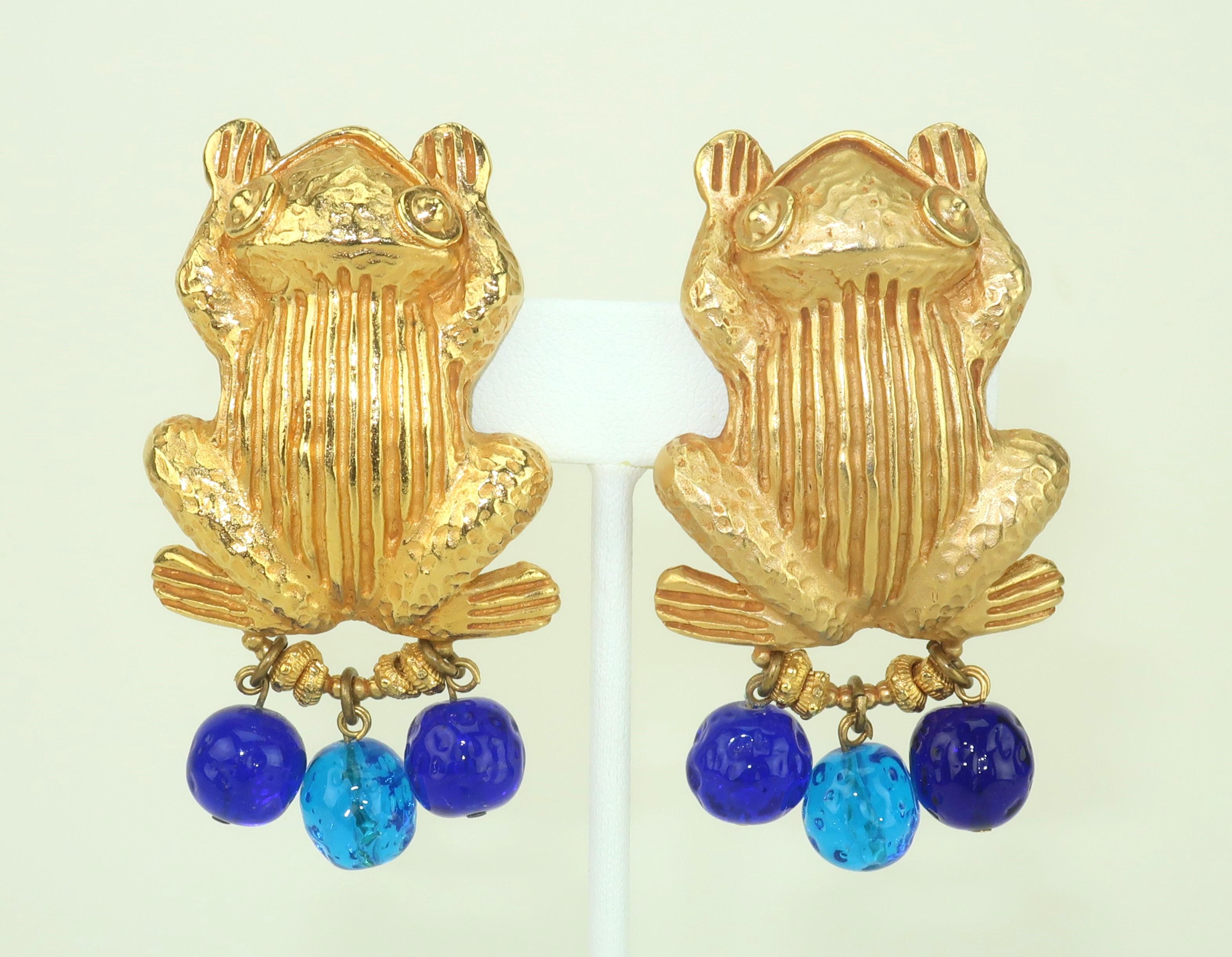 1980’s gold plate frog clip on earrings with royal and brilliant blue Gripoix glass dangles by French designer, Dominique Aurientis.  The charming frogs are ornately detailed with striations and dimples.  Hallmarked at the back … made in France. 