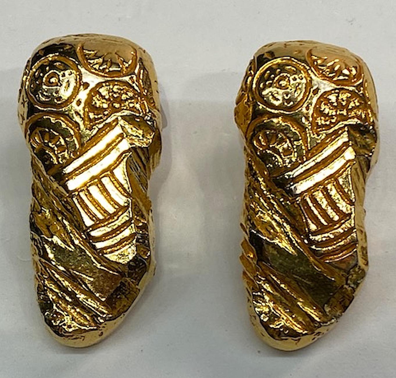 A wonderful abstract pair of 1980s Dominique Aurientis earrings. Three dimensional and beautifully cast golden nuggets with surface designs. Each earring measures 1 inch wide, 2.13 inches long and .5 of an inch deep not including the clasp. Back of
