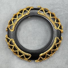 Dominique Aurientis Brazalete vintage de madera negra con cuerda dorada y detalle de celosía