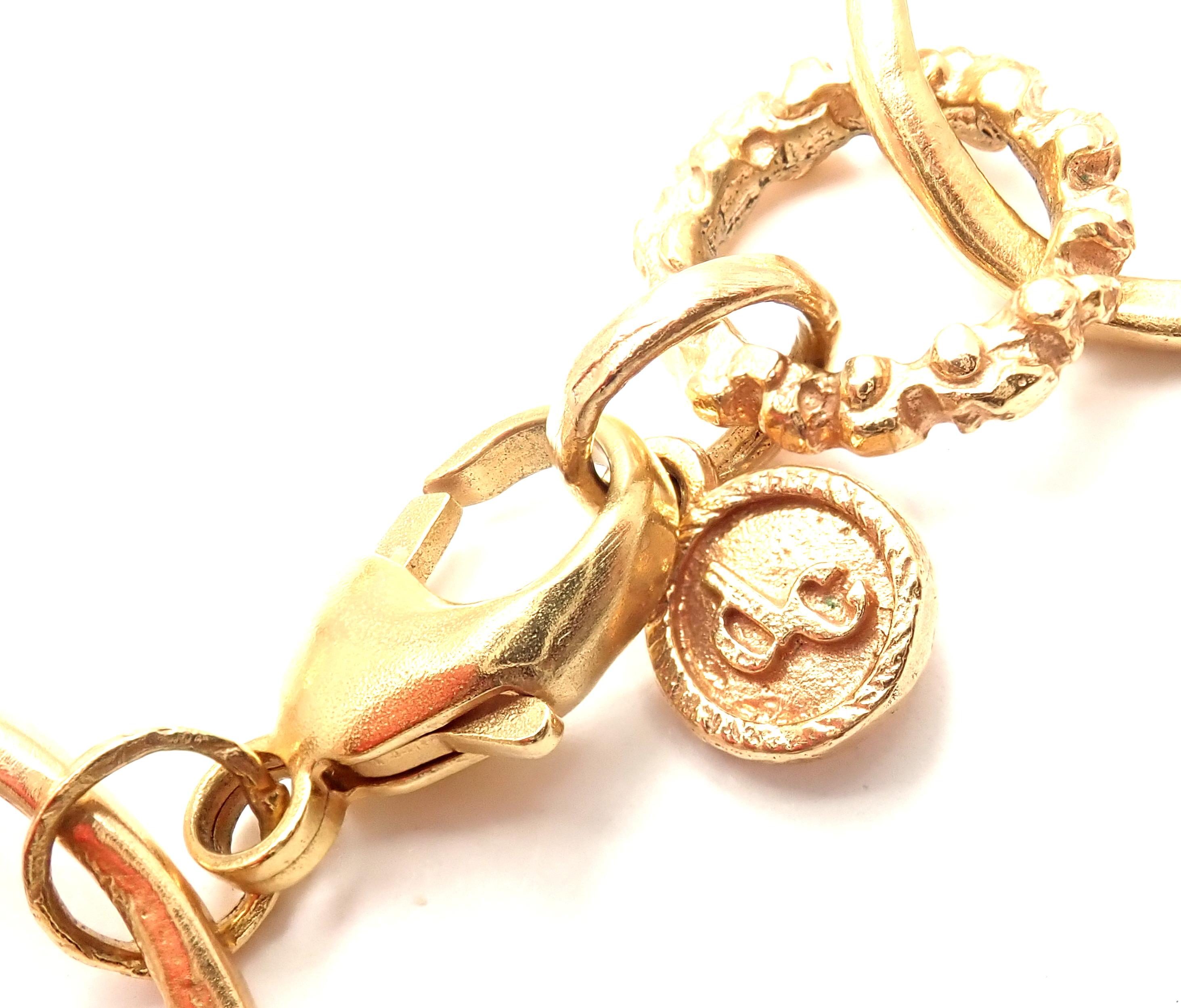 18k Yellow Gold Link Buddha Bracelet by Dominique Cohen.
Retail Price: $6,200
Details: 
Weight: 37.7 grams
Length: 8