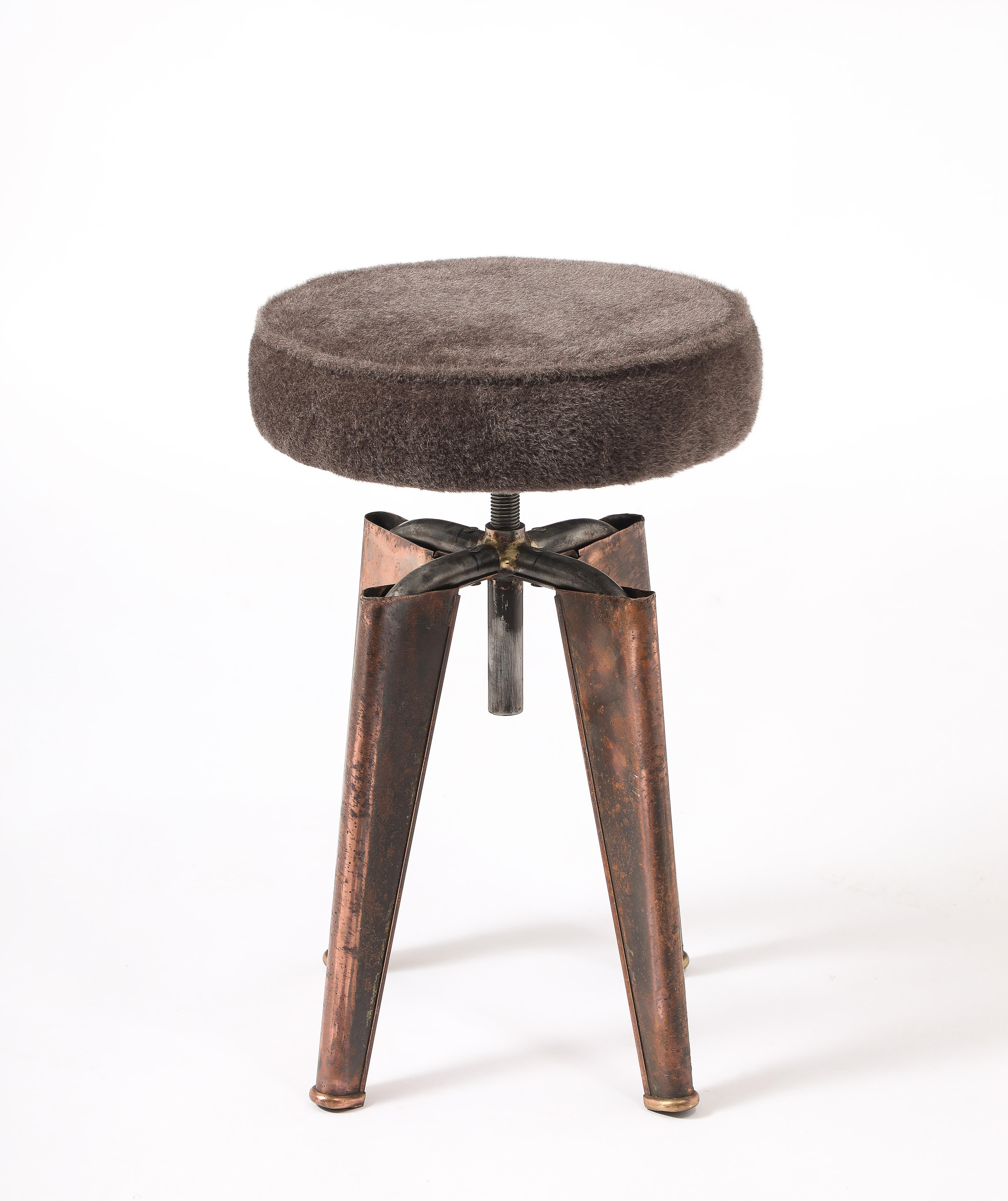 Adjustable stool by Domin & Genievre for the Clemenceau warship. A rare copper version of the famous stool.
