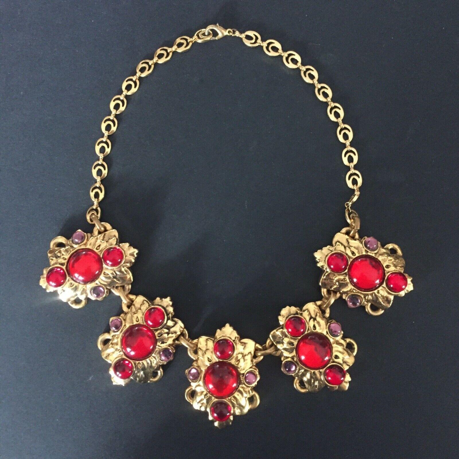 Extremely rare sublime NEO Baroque NECKLACE,
Vintage 1980s,
by essential designer DOMINIQUE DENAIVE,
high fashion,
in resin and glass cabochons,
total length 49 cm, length without chain 20 cm, height 5 cm, weight 135 g,
very good state.

(if you are