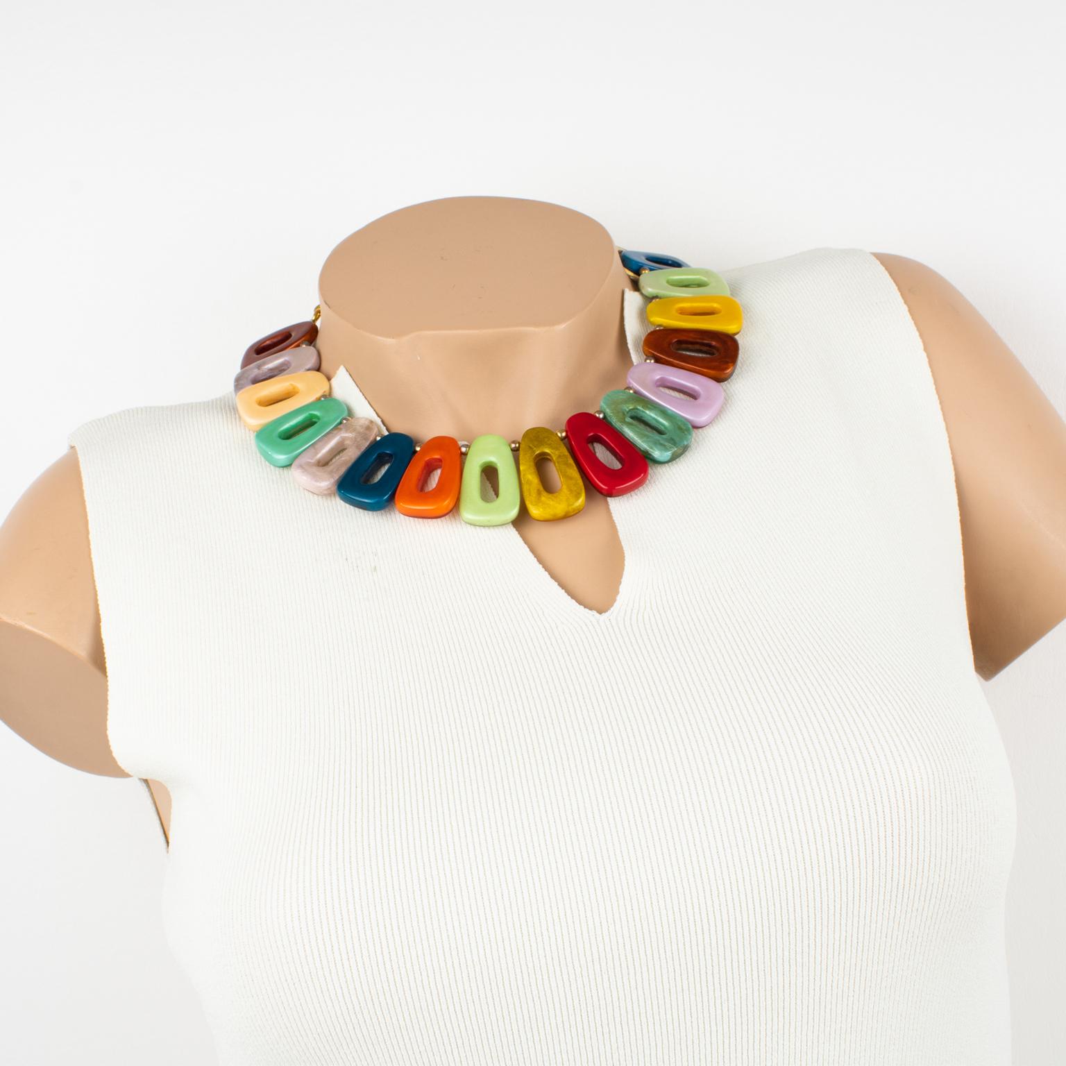 Stunning Dominique Denaive Paris choker necklace. Statement design with resin and gilt metal chain ornate with textured resin donut-pebble elements. Vivid multicolor tutti frutti pearlized tones. Lobster closing clasp with extra gilt metal chain for
