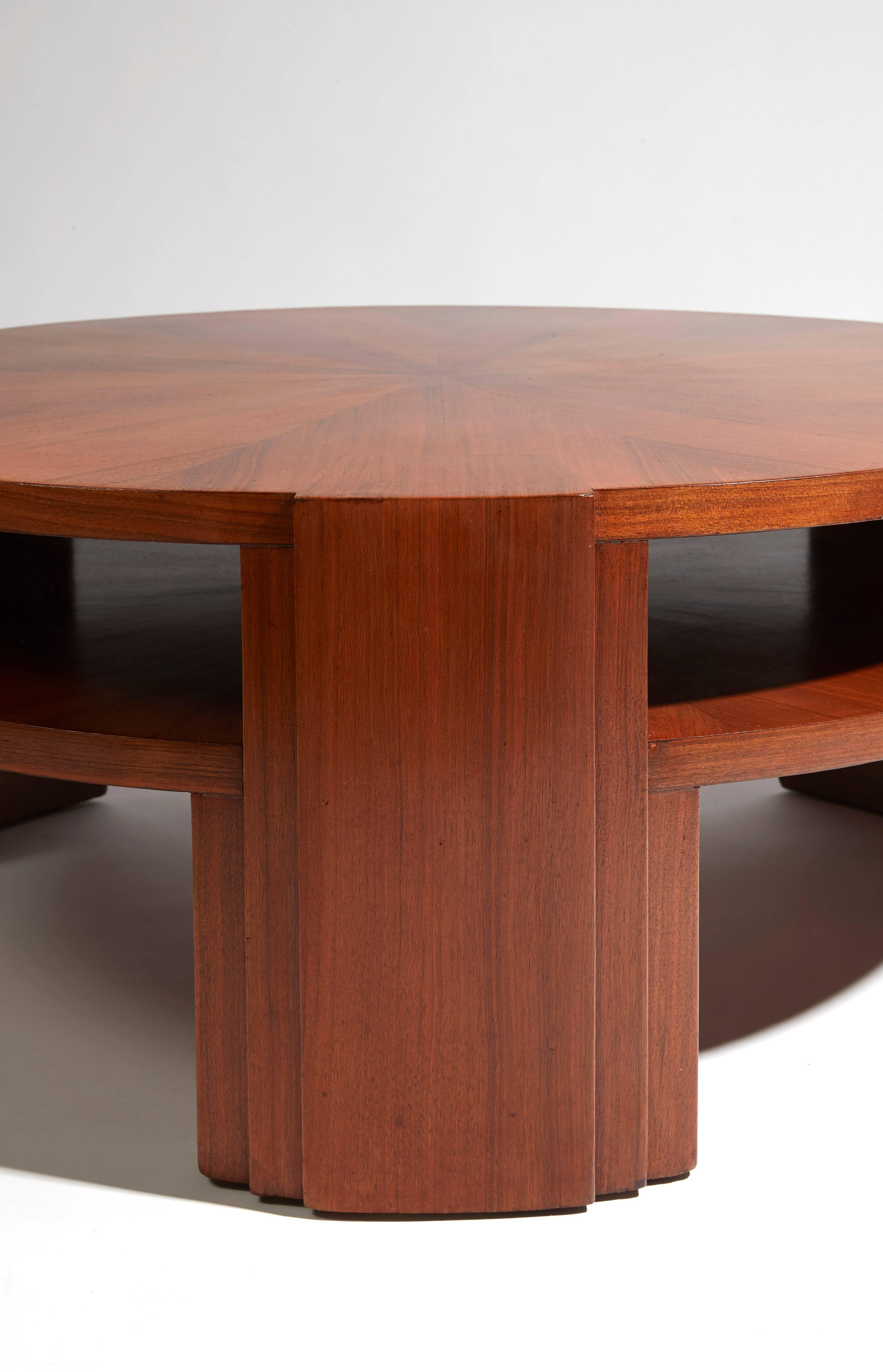French pedestal circular table, mahogany veneer, blond hue. Designed by Maison Dominique, circa 1930. 
Measures: 17 x 39 in.