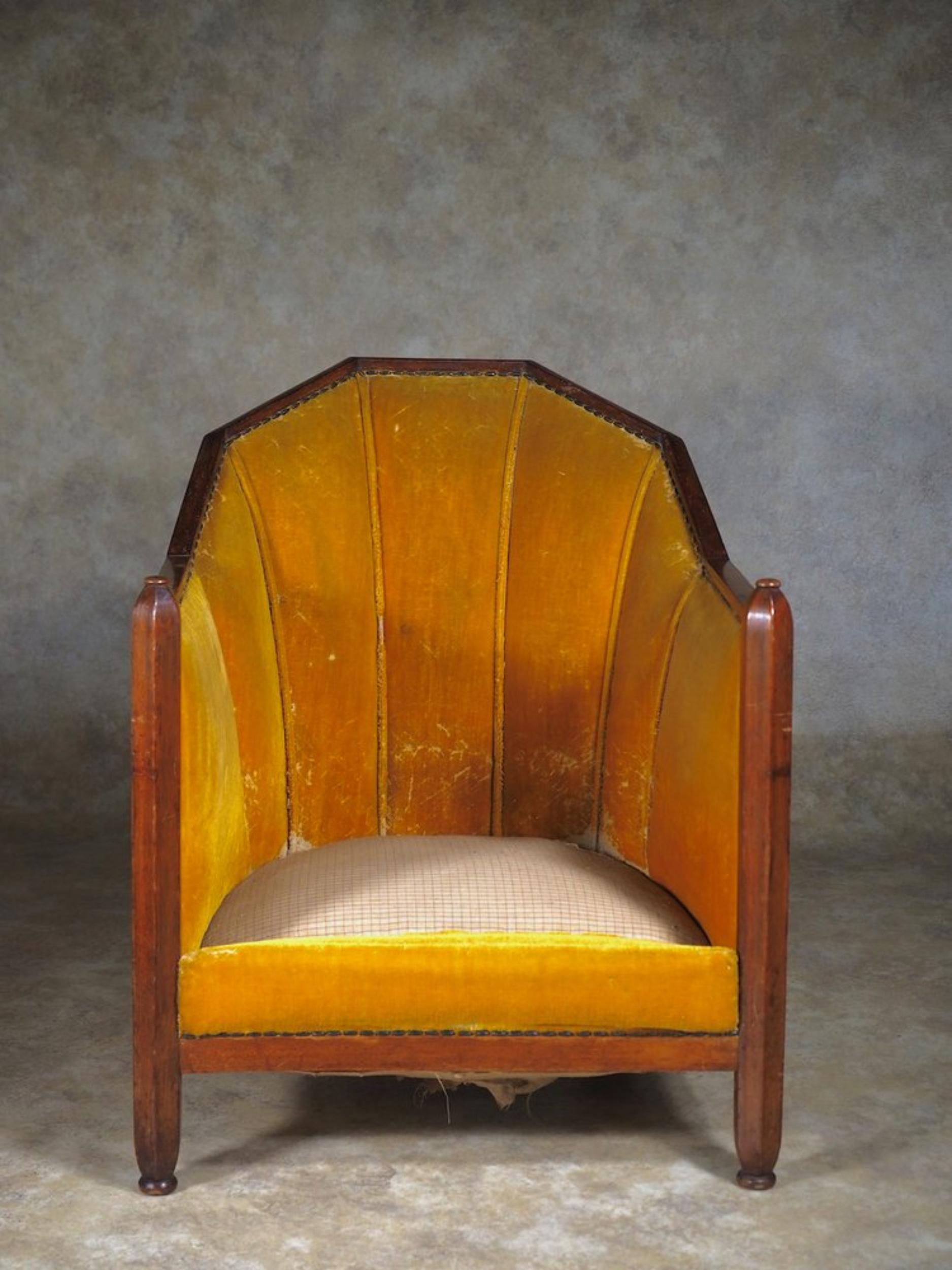 Classic French Art Deco single club chair by Dominique, circa 1926, in sculpted mahogany. 24” wide x 30” deep x 30” high.

DOMINIQUE
From a 1929 French exhibition catalog 