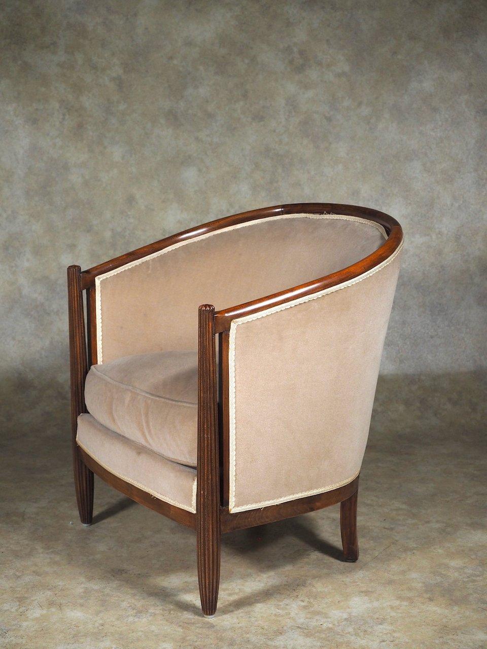 French Art Deco single round-backed club chair by Dominique, circa 1925, in mahogany. 25” wide x 23” deep x 29” high.

DOMINIQUE
From a 1929 French exhibition catalog 