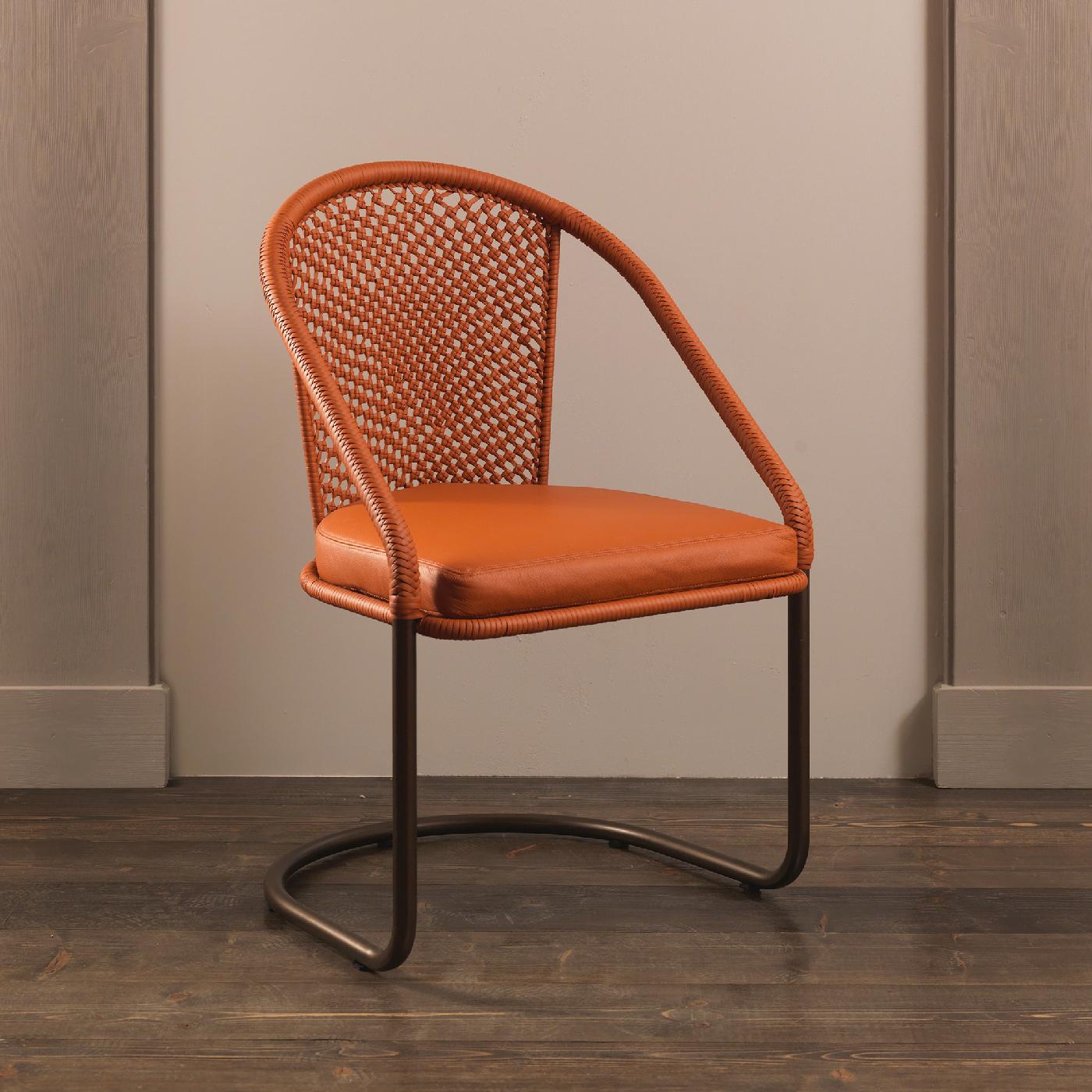This indoor chair is an exercise in elegant minimalism. It is the result of a collaboration between Officina Ciani and Ciarmoli Queda Studio and will be a unique accent piece in any room in the house. The cantilever structure is fashioned of iron