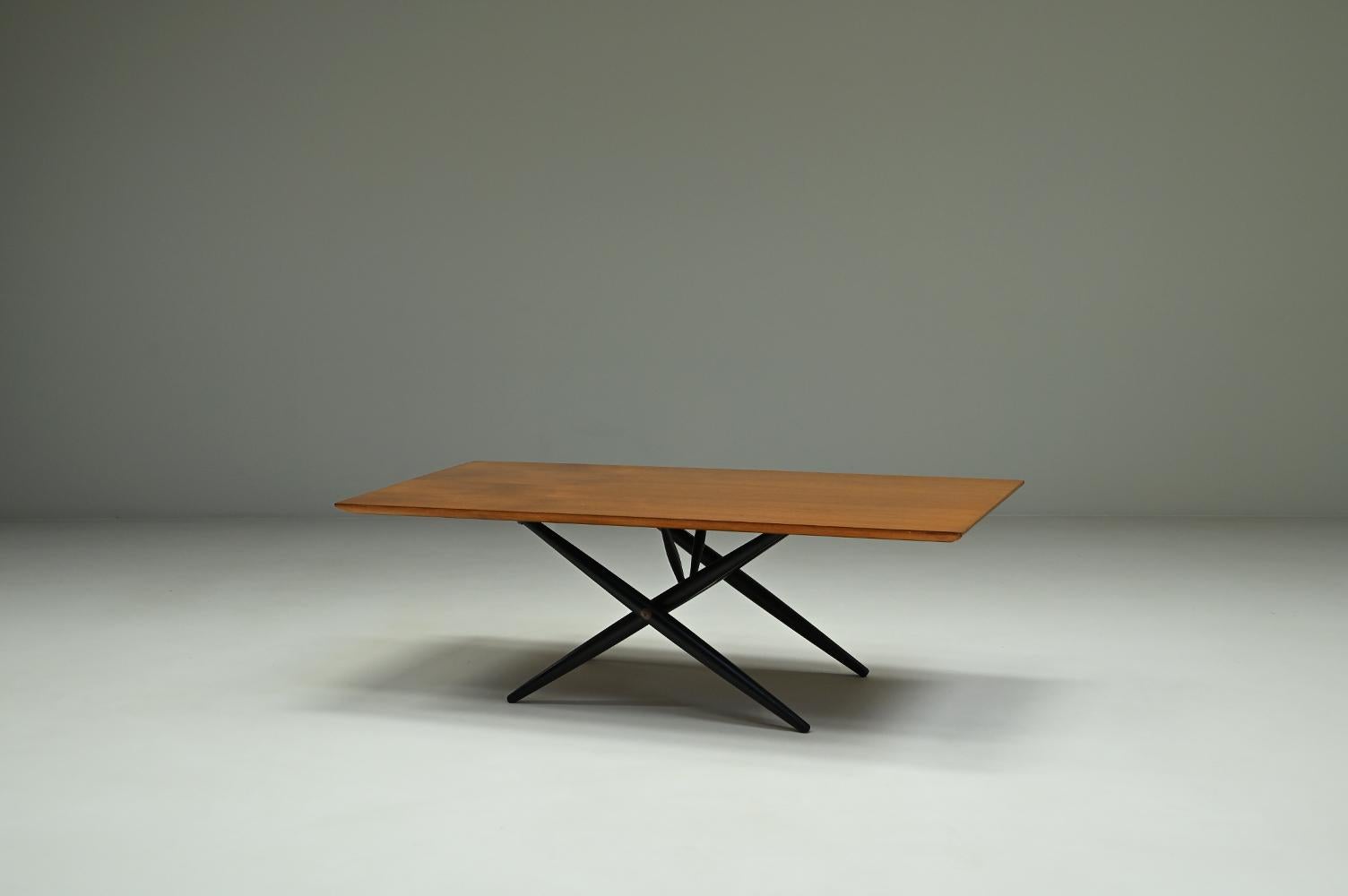 “Domino” coffee table by Ilmari Tapiovaara for Asko, 1950s Finland. Designed in 1954. Birch wood Black cross-legged base and teak rectangular top. One honist repair at a corner. Beautiful color and shine. In good vintage condition. 

– Height: 40