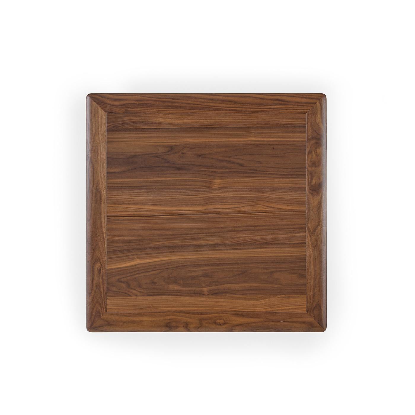 This square coffee table features a Canaletto Havana finish.