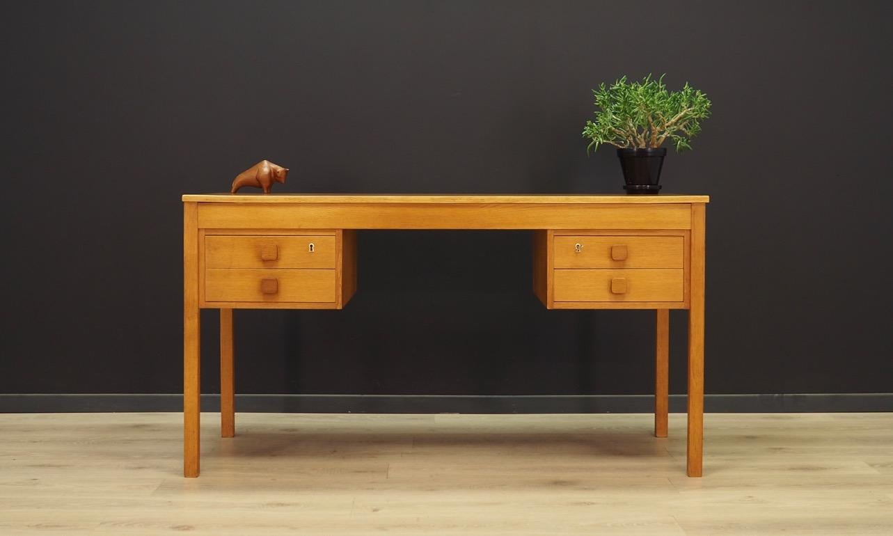 Fantastic desk from the 1960-1970s, Scandinavian design, minimalist form. Manufactured by DOMINO Mobler. Table top finished with ash veneer, legs made of solid ash wood. Desk has four drawers, key included. Maintained in good condition (minor