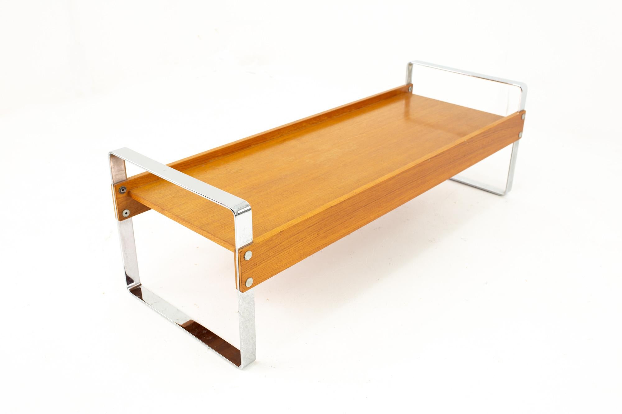 Domino Mobler Mid Century Chrome and Teak Bench

Bench measures: 47.5 wide x 17.5 deep x 15 high

This price includes getting this piece in what we call Restored Vintage Condition. That means the piece is permanently fixed upon purchase so it’s