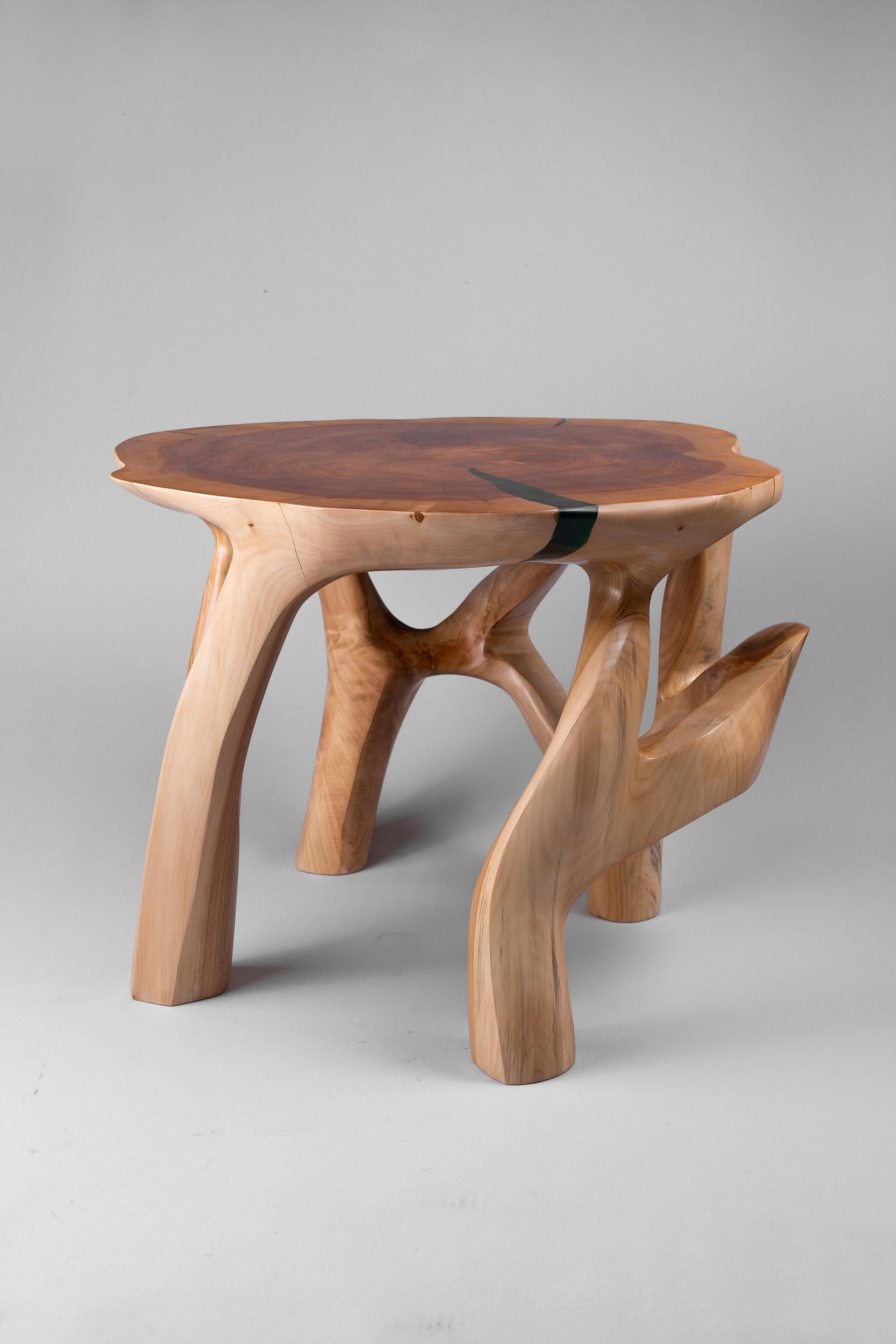 Domus is a coffee table made from a single block of wood.‎ The purpose of this coffee table is to be placed next to a warm hearth, a place where the whole family gathers and tells stories on long winter nights.‎ Functional sculpture carved from a