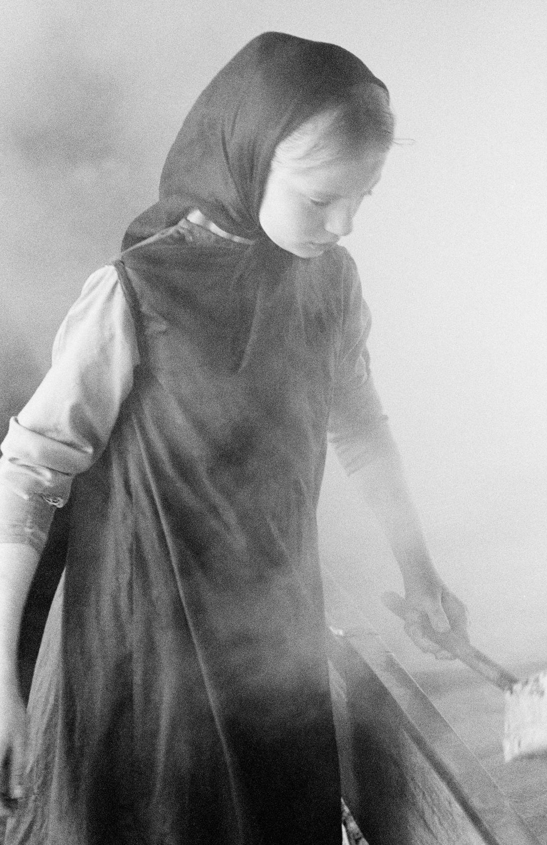 Don Dudenbostel Abstract Photograph - Mennonite Girl Working
