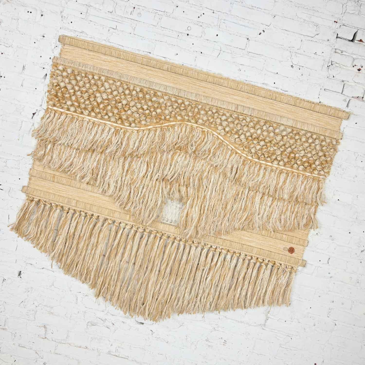 Fabulous modern textile woven wall hanging designed by Don Freedman c/o Tree Time for Interlude Inc. Comprised of jute, art silk, wood, wool, and cotton. Beautiful condition, keeping in mind that this is vintage and not new so will have signs of use