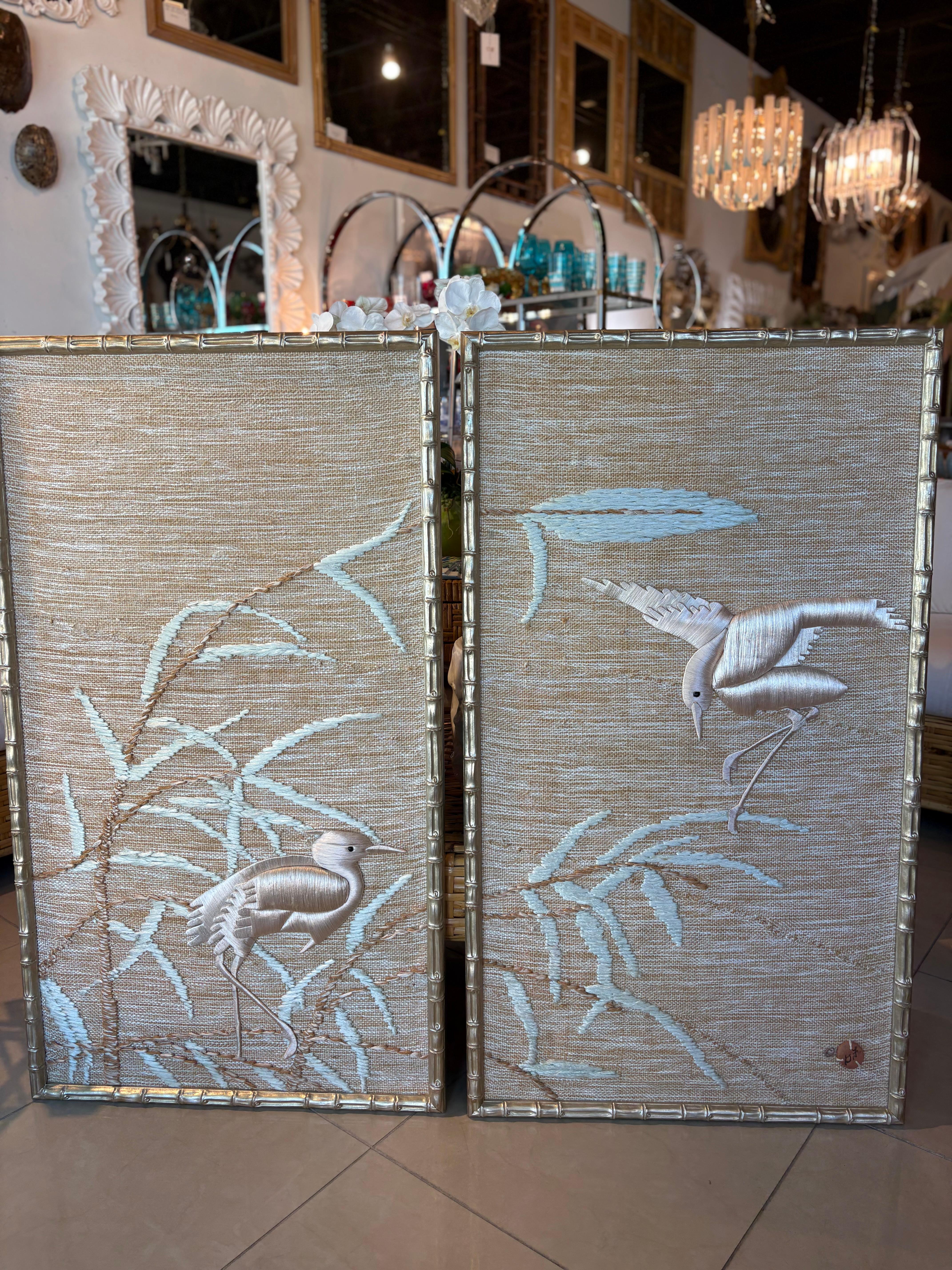 Pair of vintage 1970s Don Freedman (signed) woven textile wall tapestry tapestries. Woven with various threads, silk, jute, etc. Beautiful soft colors of seafood green, creams, light pinks. Lovely birds and branches. We've had these professionally