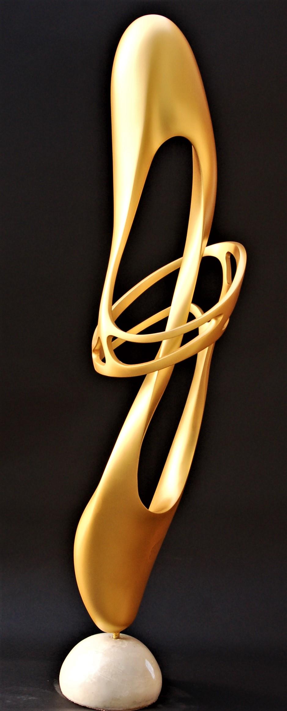 Carnival
Fiberglass / Composites Filled Resin Base Gold Metallic Finish
47" x 12" x 10"

"I am an artist, a sculptor not by choice but by destiny as each step in the path I followed guided me towards a life of creativity. The psychological impact of