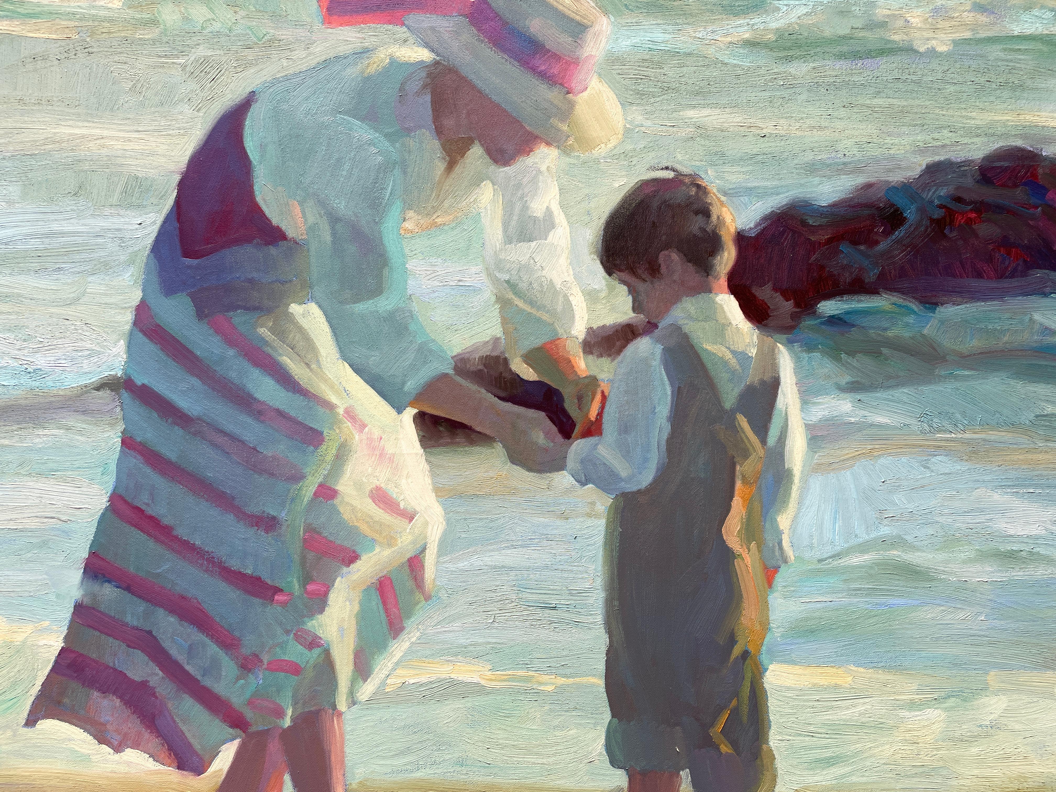 Madre e hijo en la playa
