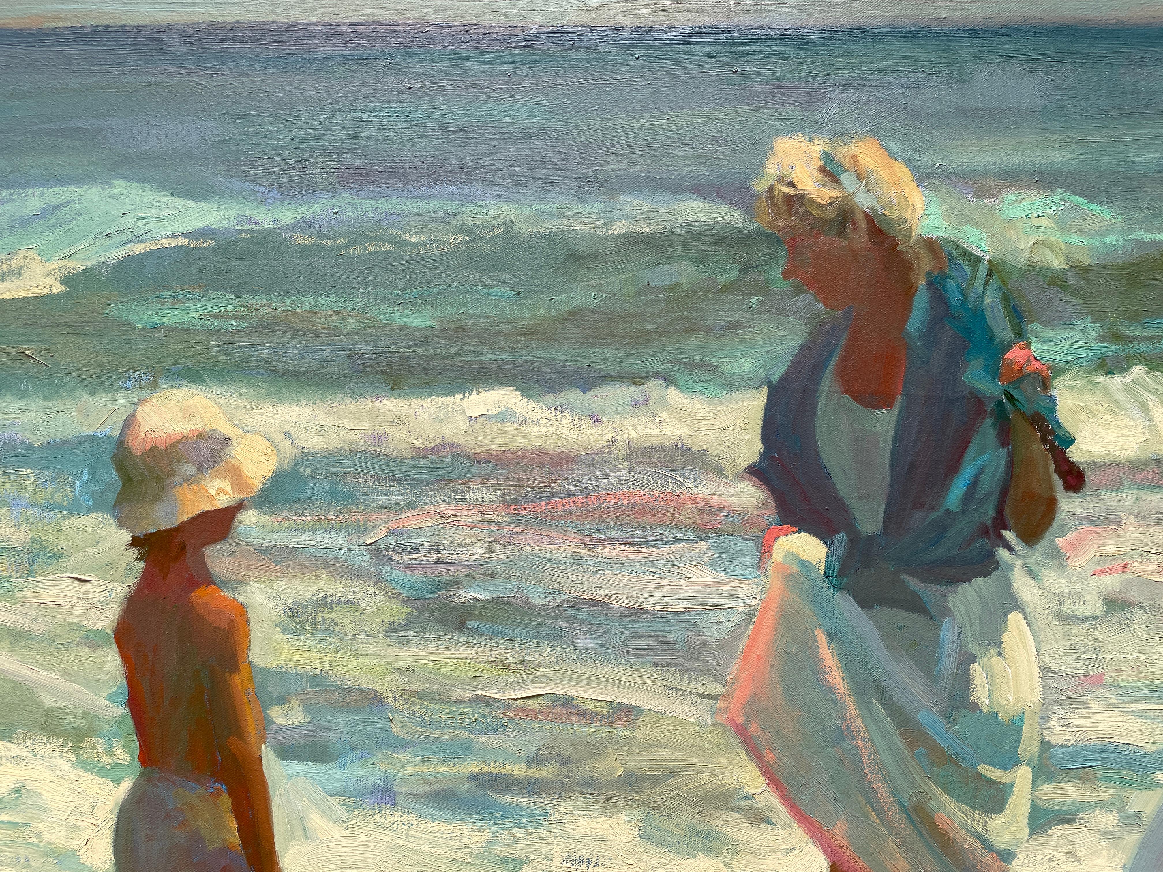 Madres y niños en la playa