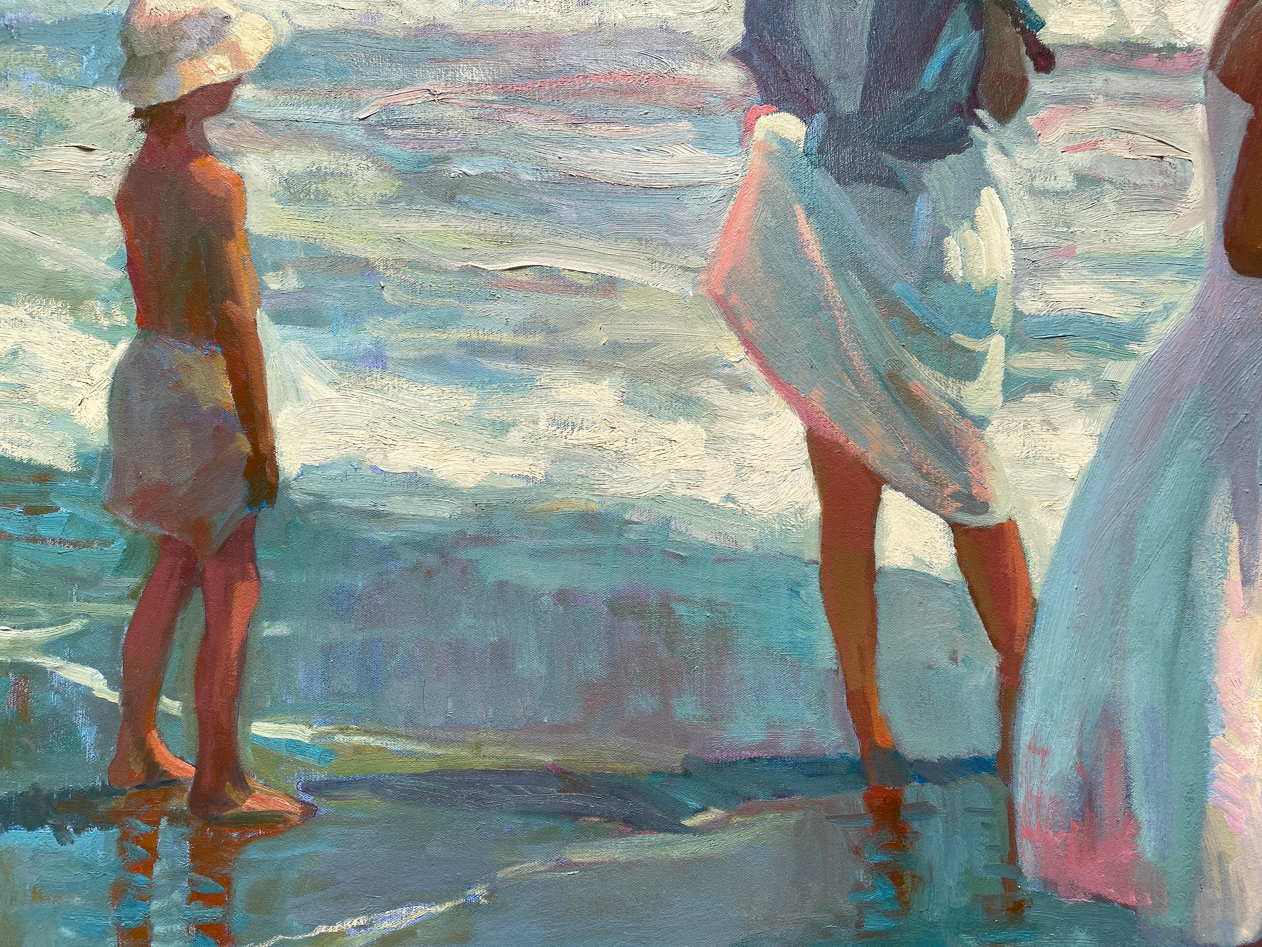Madres y niños en la playa