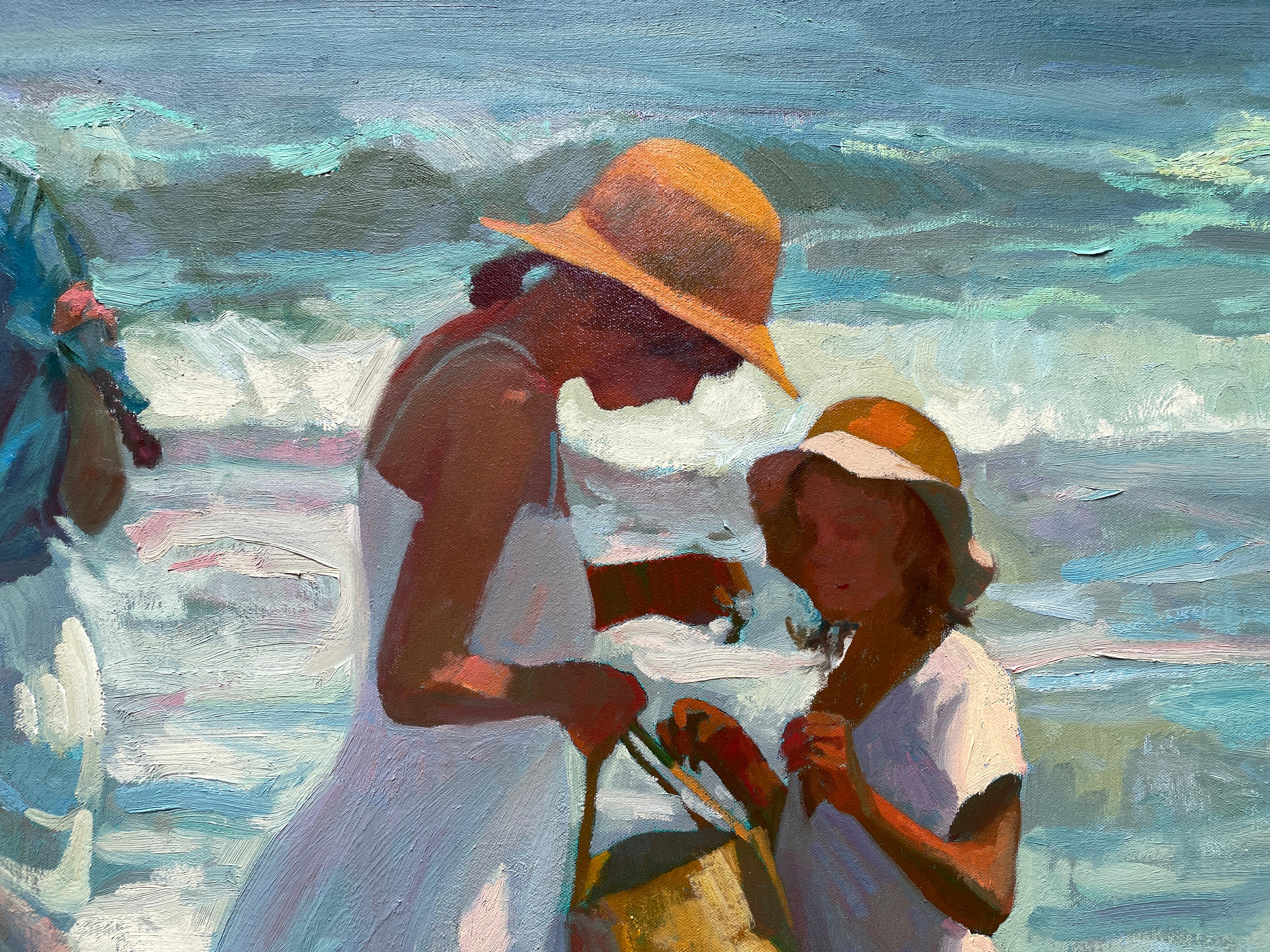 Madres y niños en la playa