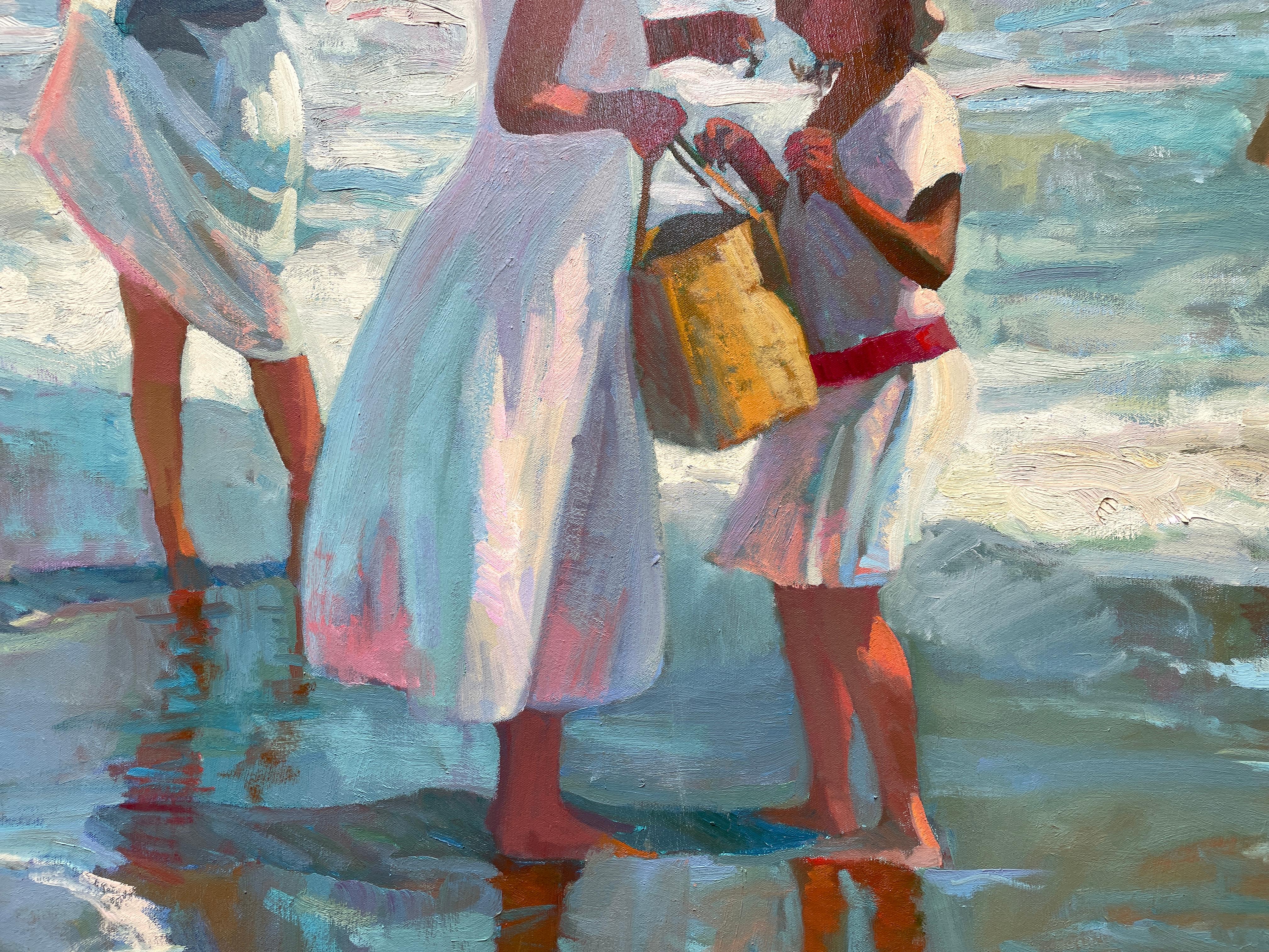 Madres y niños en la playa