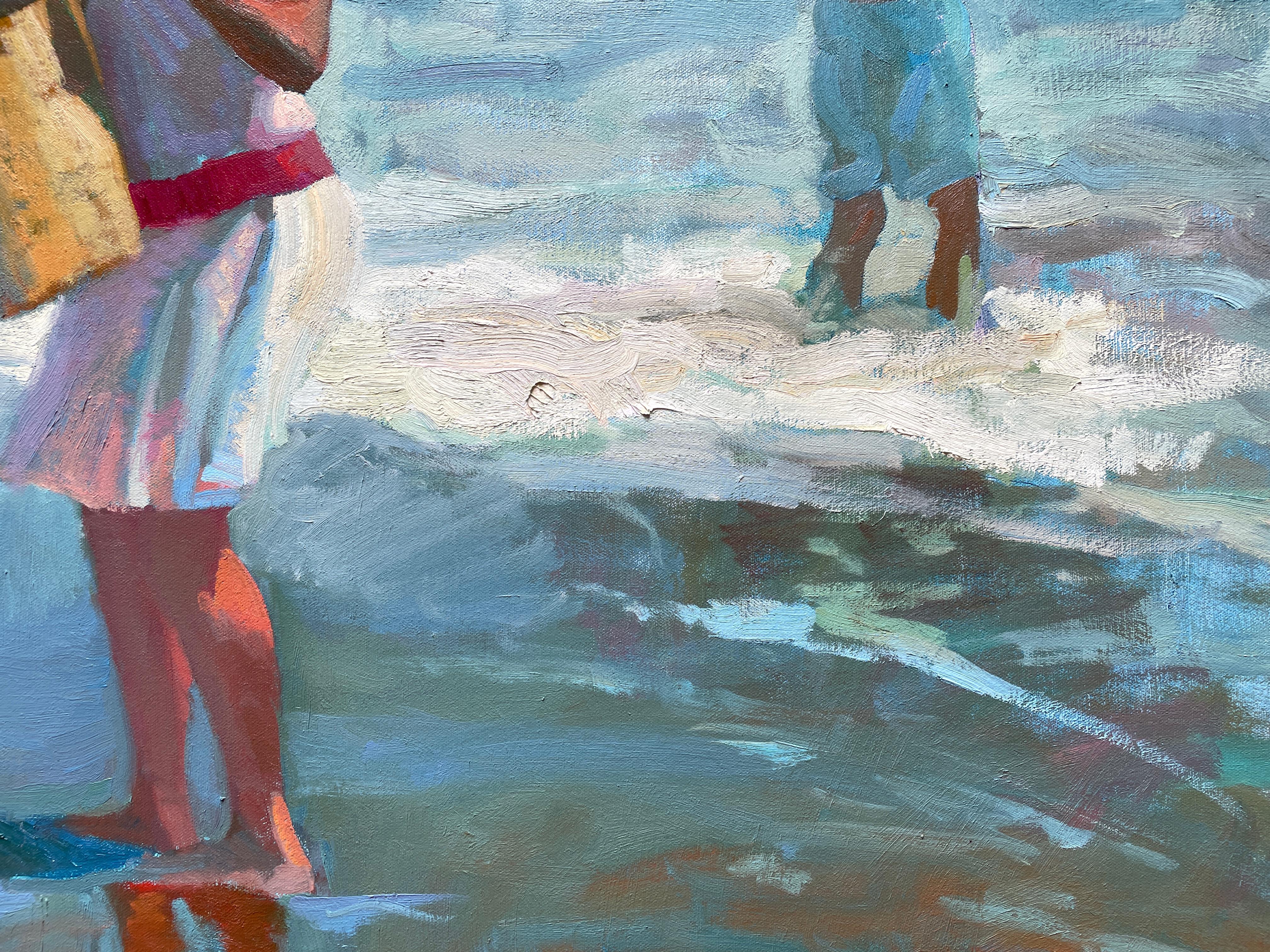 Madres y niños en la playa