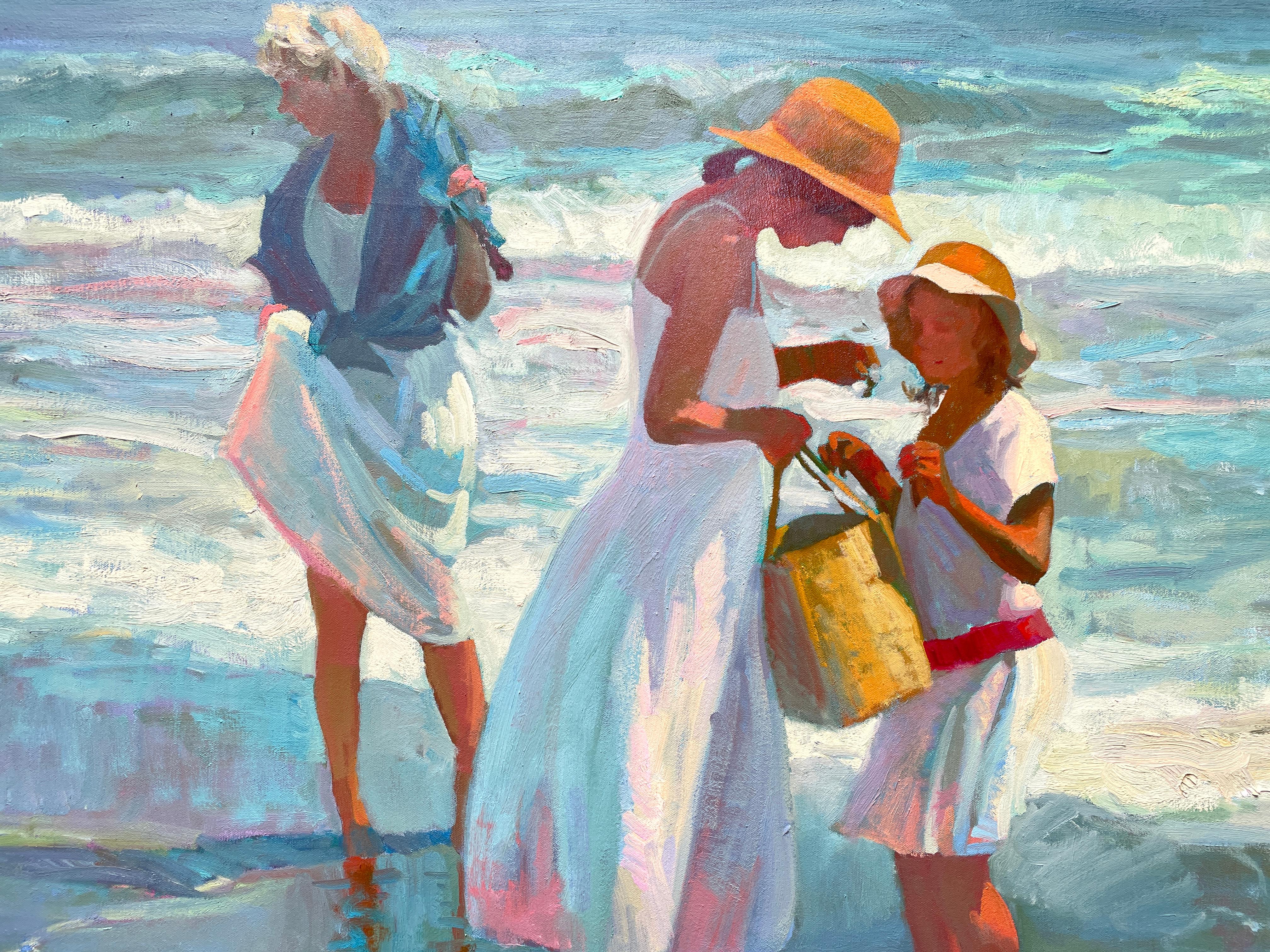 Madres y niños en la playa