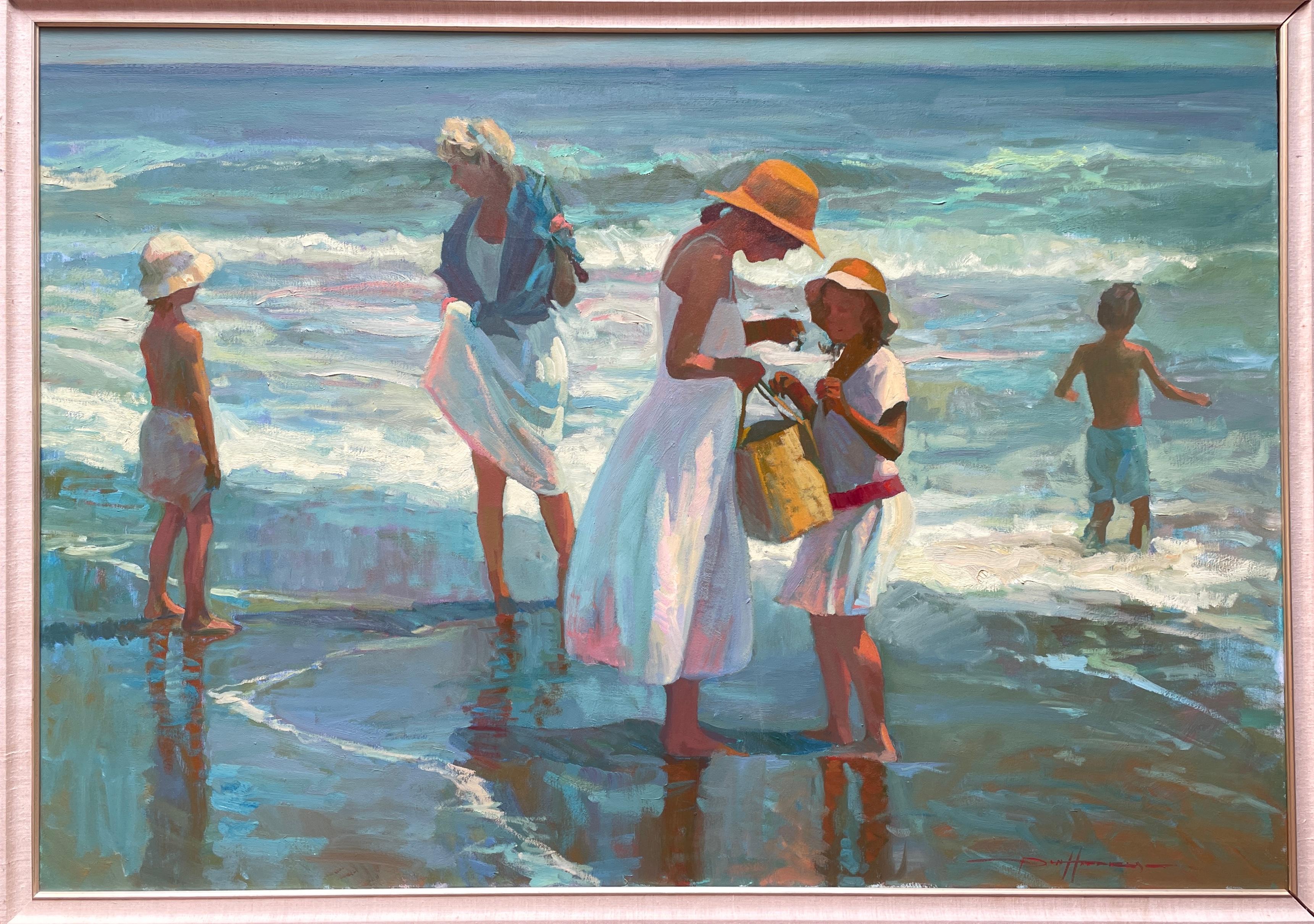 Madres y niños en la playa