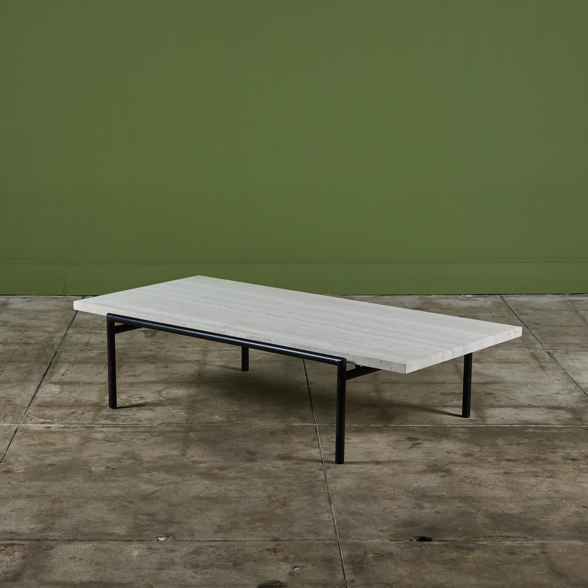 Travertine coffee table by Don Knorr for Vista of California, c.1950s. This table showcases a rectangular travertine slab table top set in a black tubular steel frame.

Don Knorr attended Cranbrook after obtaining an architecture degree and went on
