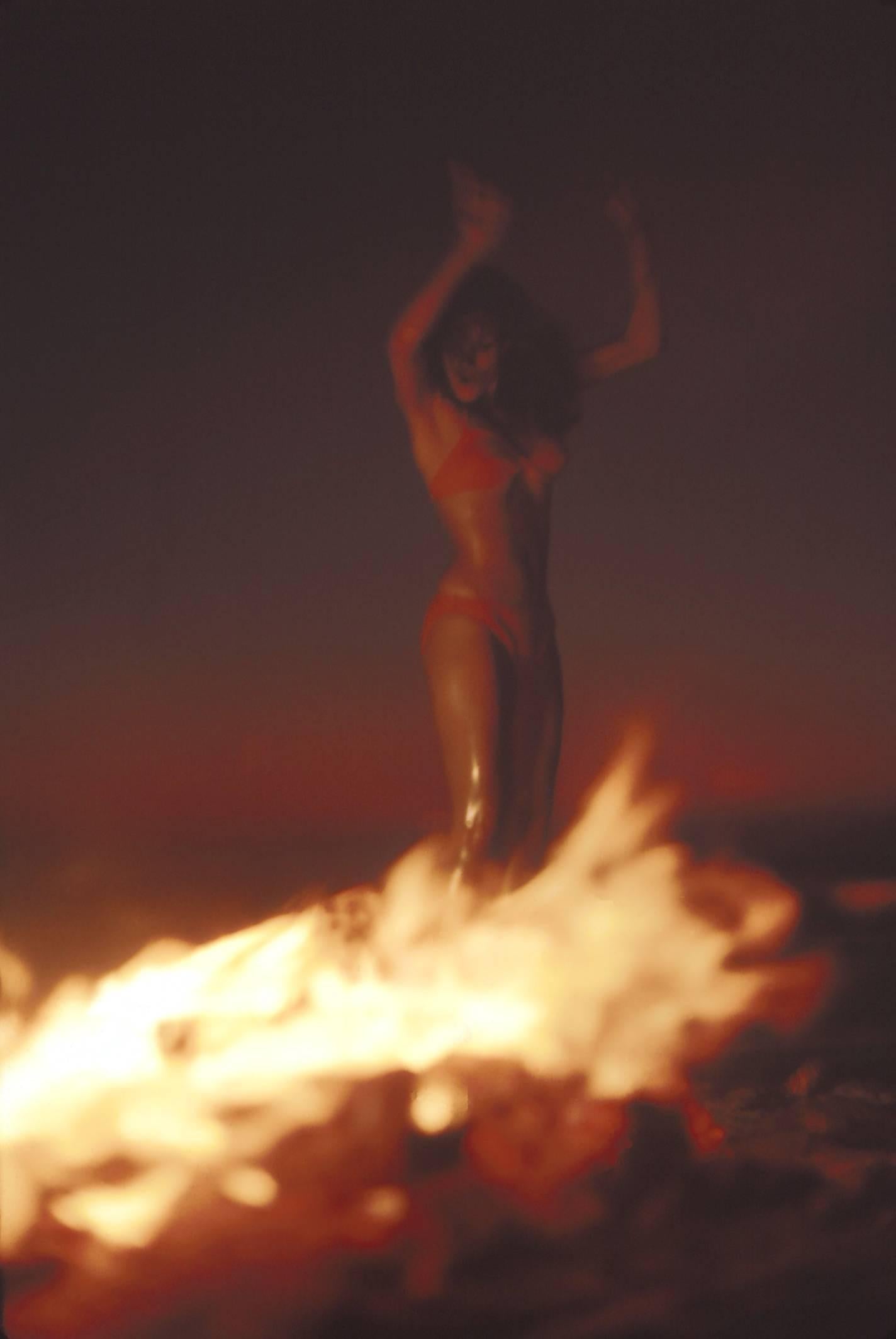Don Ornitz Portrait Photograph - Raquel Welch Dancing With Fire Fine Art Print