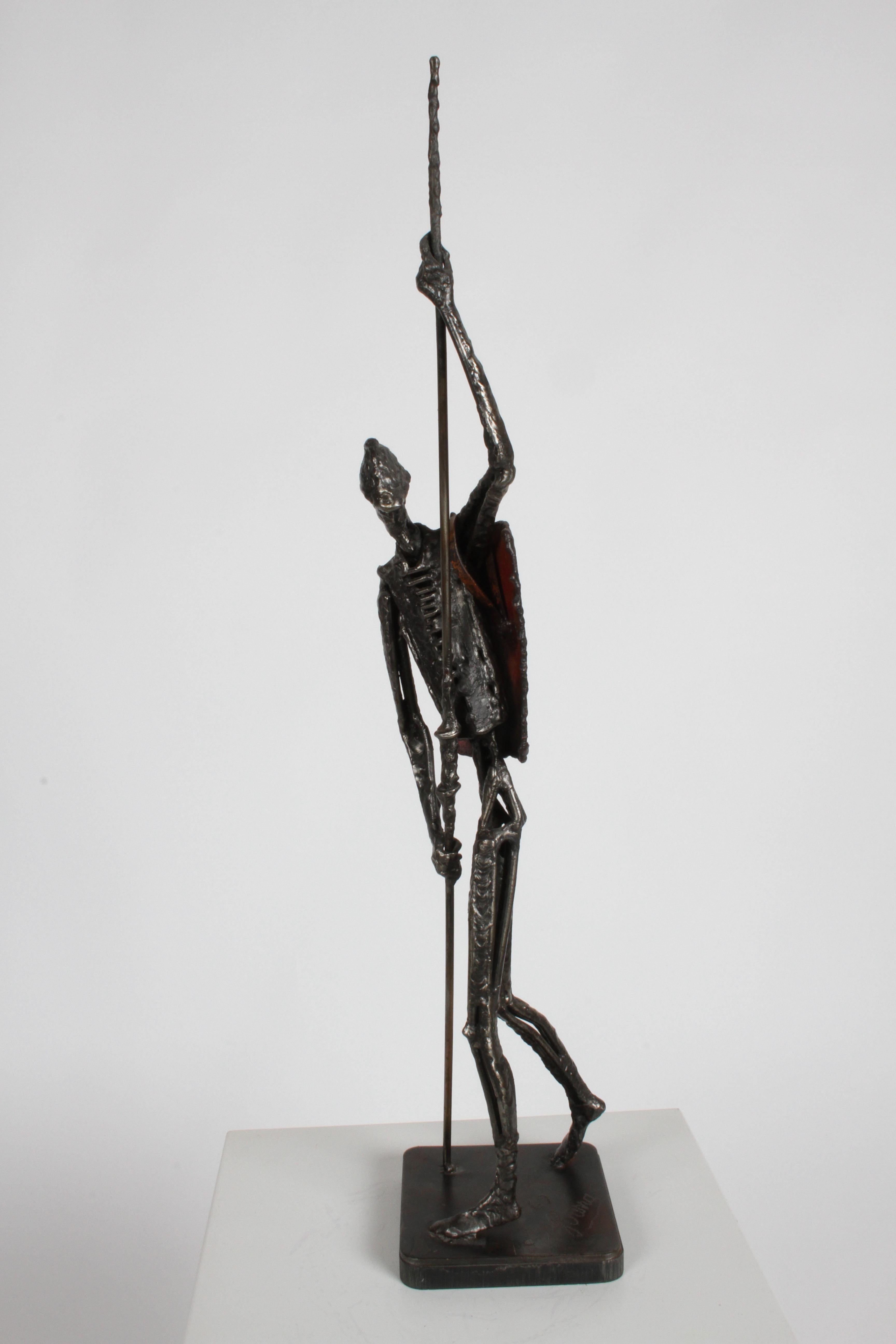 Mid-Century Modern Brutalist figurative sculpture of Don Quixote by Mexican / American artist Simon Ybarra (1913-2003). Signed on base Ybarra '69. Welded figure hold spear, with enameled shield / armour on square base. In fine condition.