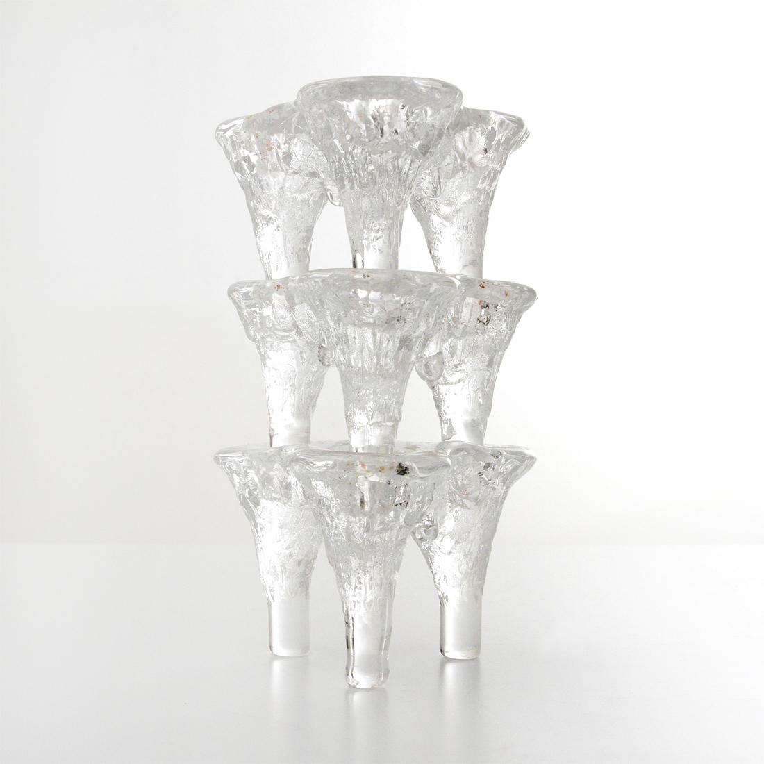 American-made candle holders made by Blenko based on a design by Don Shepherd in the 1970s.
Handcrafted glass structure.
Each element can house three candles and can be assembled together.
Good general conditions.

Dimensions: Width 13 cm,