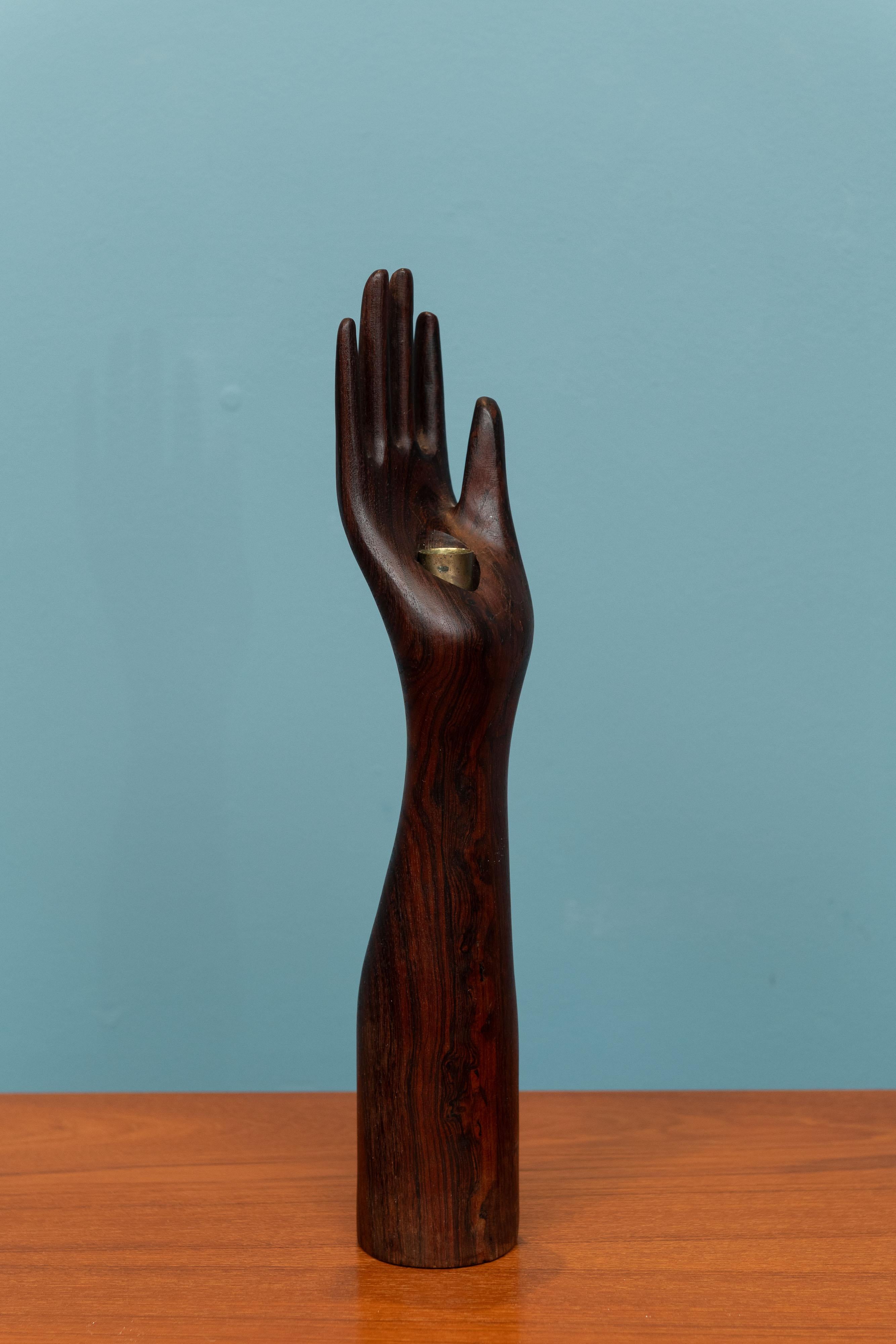 Don Shoemaker design solid rosewood carved candlestick in the shape of a women's arm and hand. Elegant design by Don Shoemaker for his company Senal, Mexico. In very good original condition, labeled.