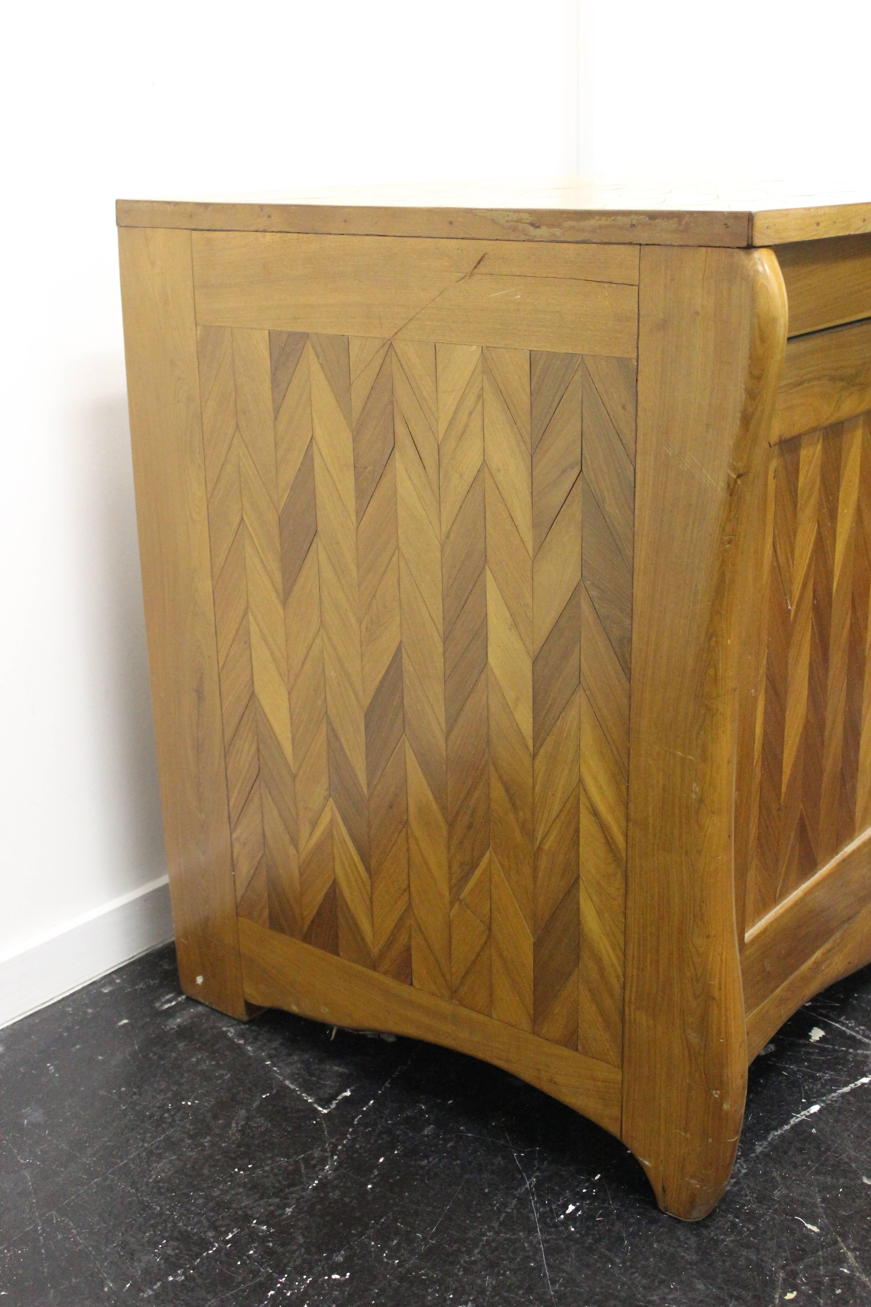 Beautiful and exotic credenza or sideboard by American designer Don Shoemaker, signed on back.