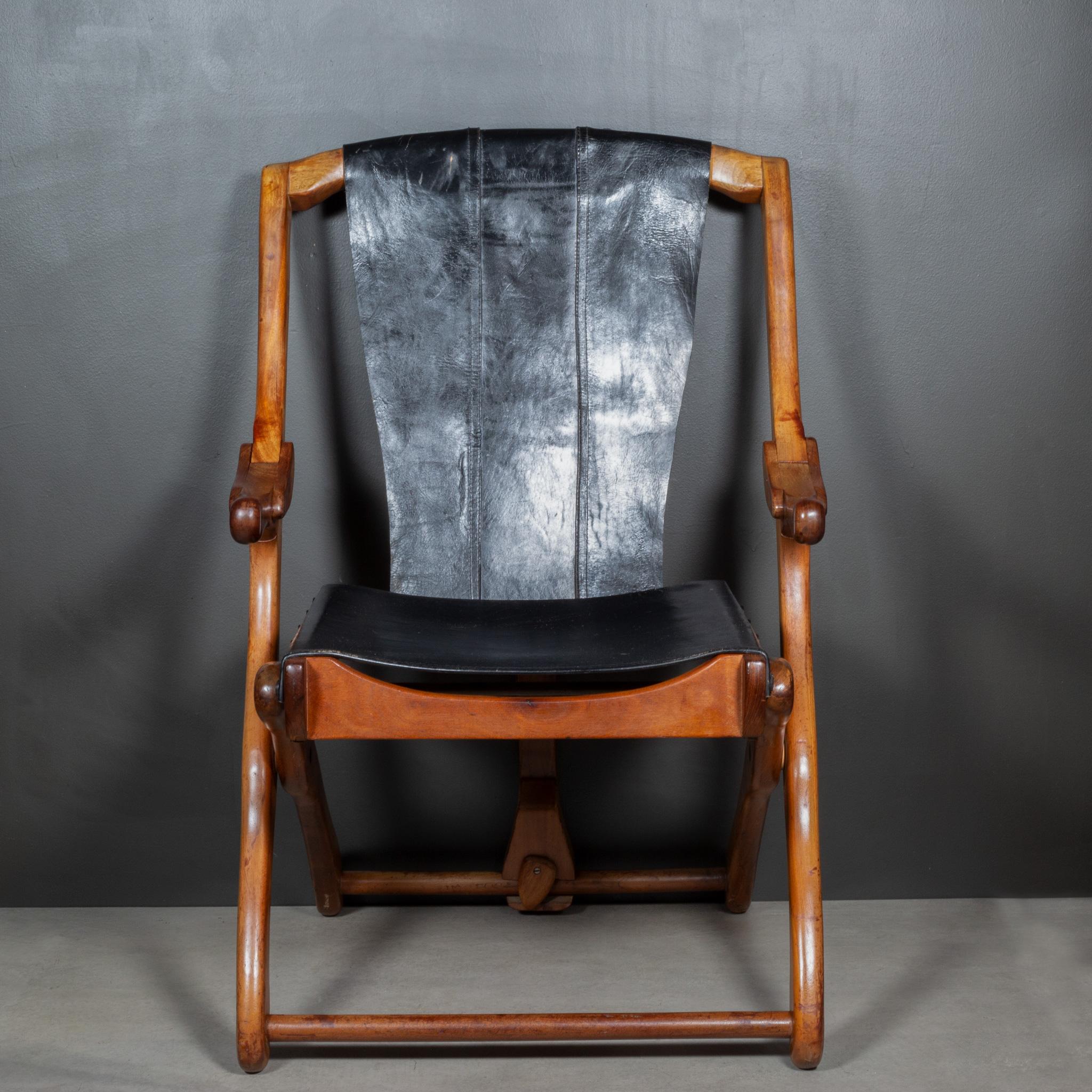 ABOUT

Price is per chair. Four available. 

Original folding lounge chairs designed by Don Shoemaker for Senal SA. The chairs are made out of Cocobolo Rosewood and upholstered in the original black leather with decorative leather pins on the top