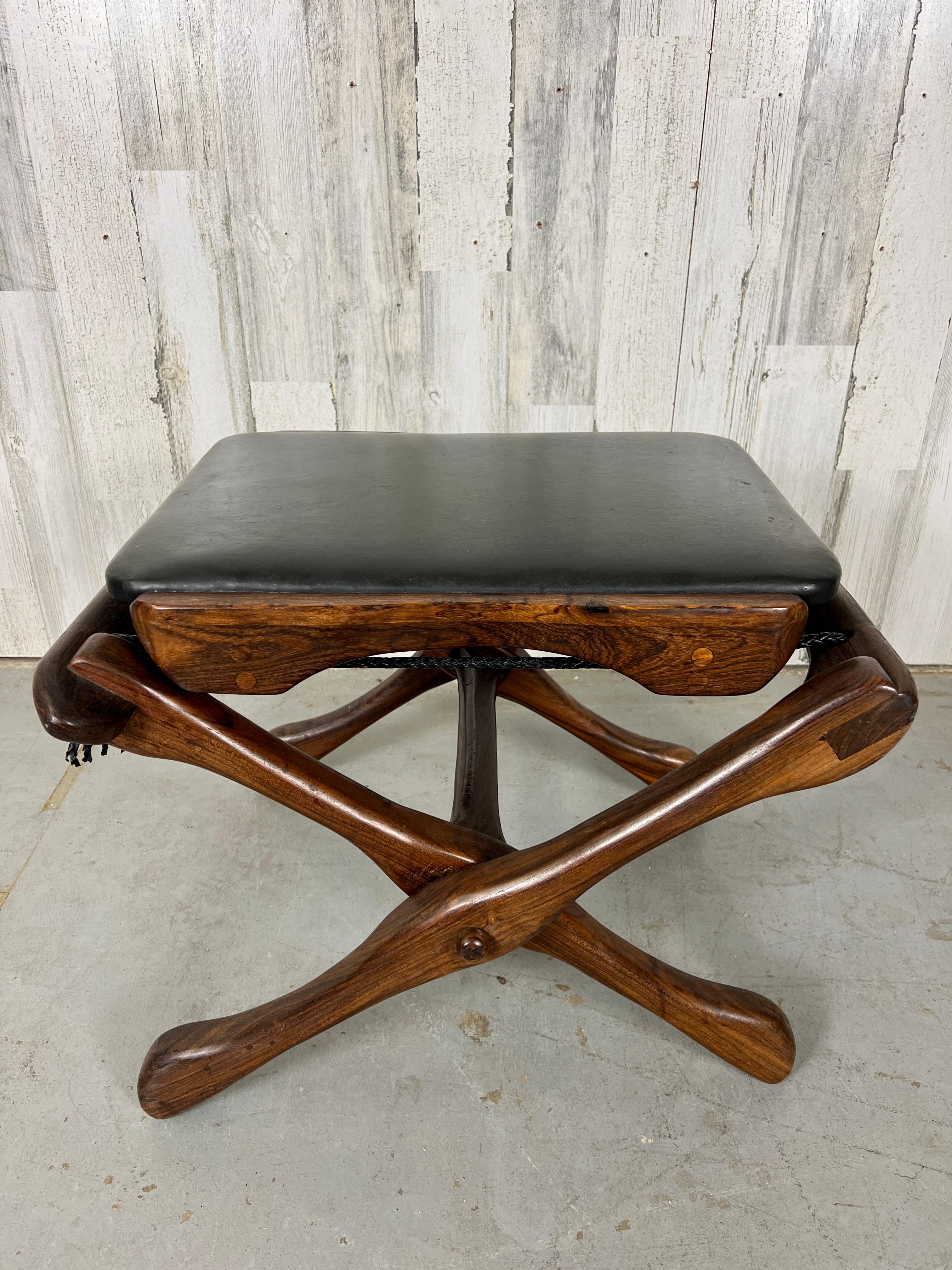 Don Shoemaker Folding leather & rosewood stool for Señal Furniture. Recently re-corded in a beautiful black bolo leather cord.
   