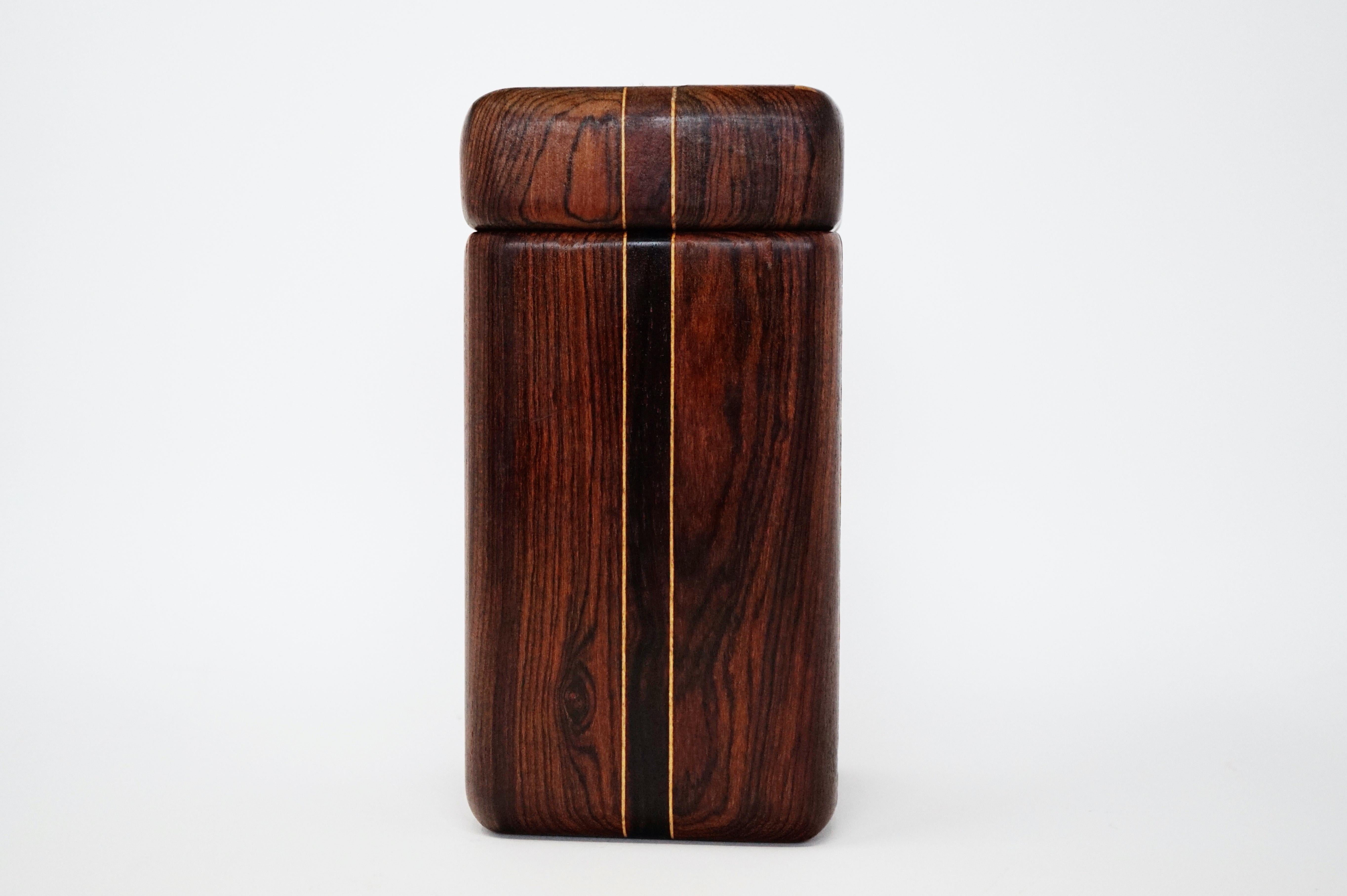 This incredible Cocobolo Rosewood large lidded catchall box by leading 1960s modernist designer Don Shoemaker for Senal S.A. is sought after by interior designers and avid collectors alike. This larger sized example is particularly perfect for the
