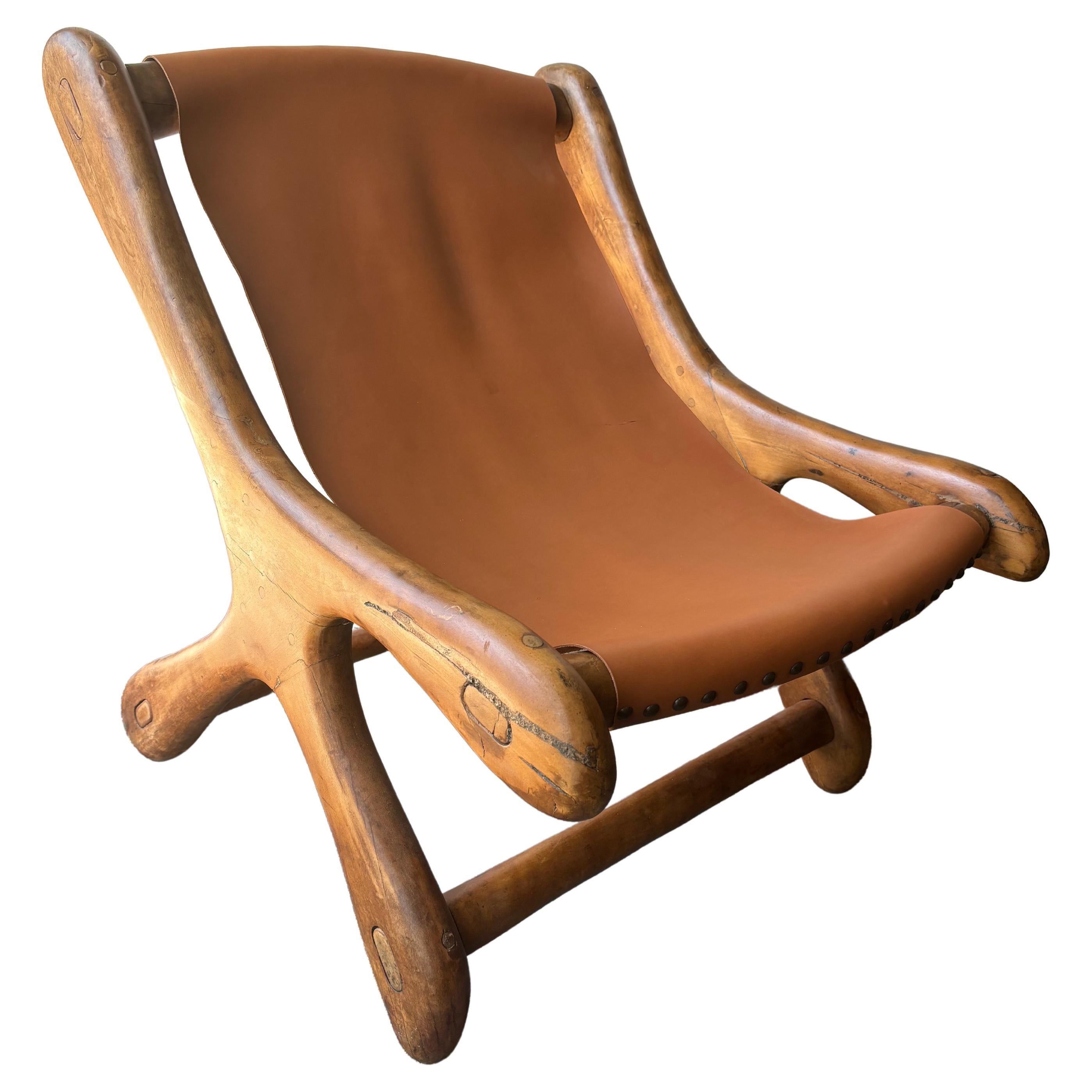 Don Shoemaker sling leather lounge chair .