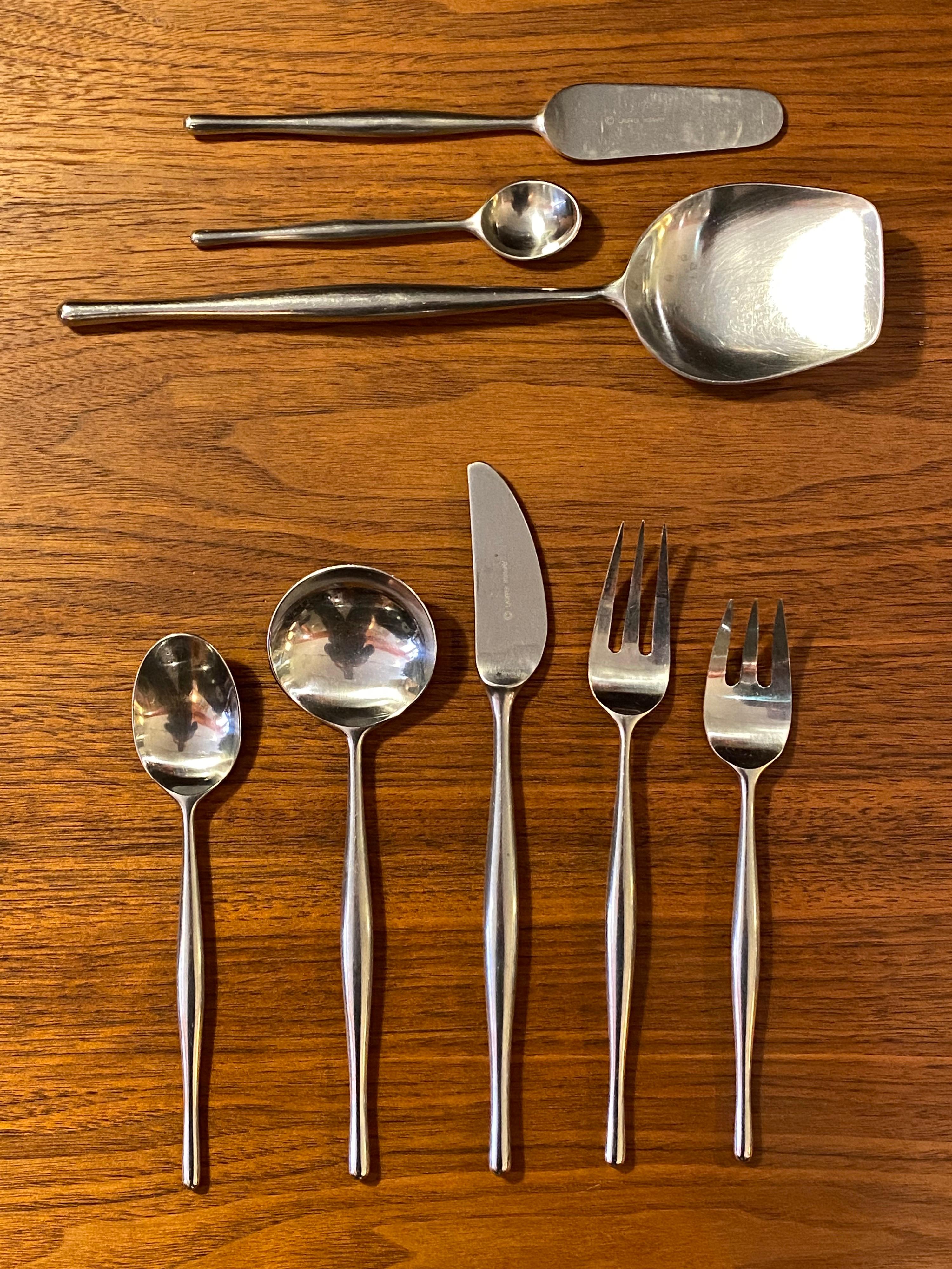 Don Wallance for Lauffer Design 3 Stainless Steel Flatware Set. Service for 8 plus 2 Serving Pieces. Harder to find Set, beautiful curved flaring Handle Design, fatter in the middle and then sleeker end. Stainless Steel Construction so Dishwasher