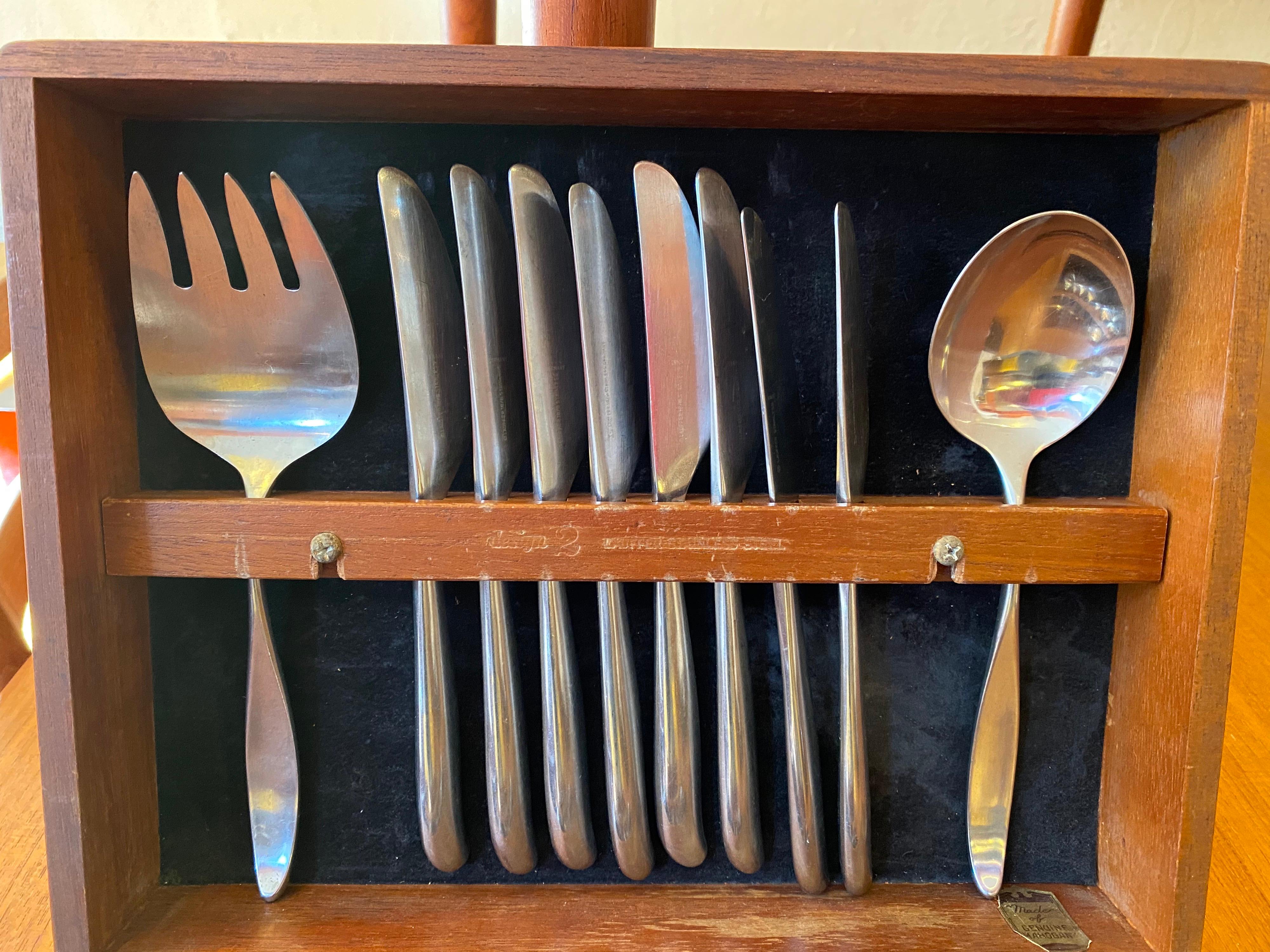 Don Wallance for Lauffer design 2 stainless flatware set. 42 pieces and it's original box. One of the nicest Scandinavian sets out there! Nice weight and scale. 8 five piece place settings and a serving fork and spoon. Inside box has some felt loss