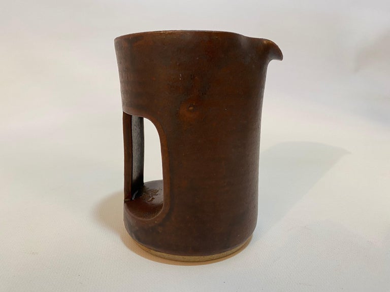 Don Williams slab built architectural art pottery pitcher or creamer. Signed on bottom. Glazed in a matte chocolate brown drip glass, circa 1980-1990. Very good condition with no visible cracks, crazing, hairlines or restorations. Don Williams