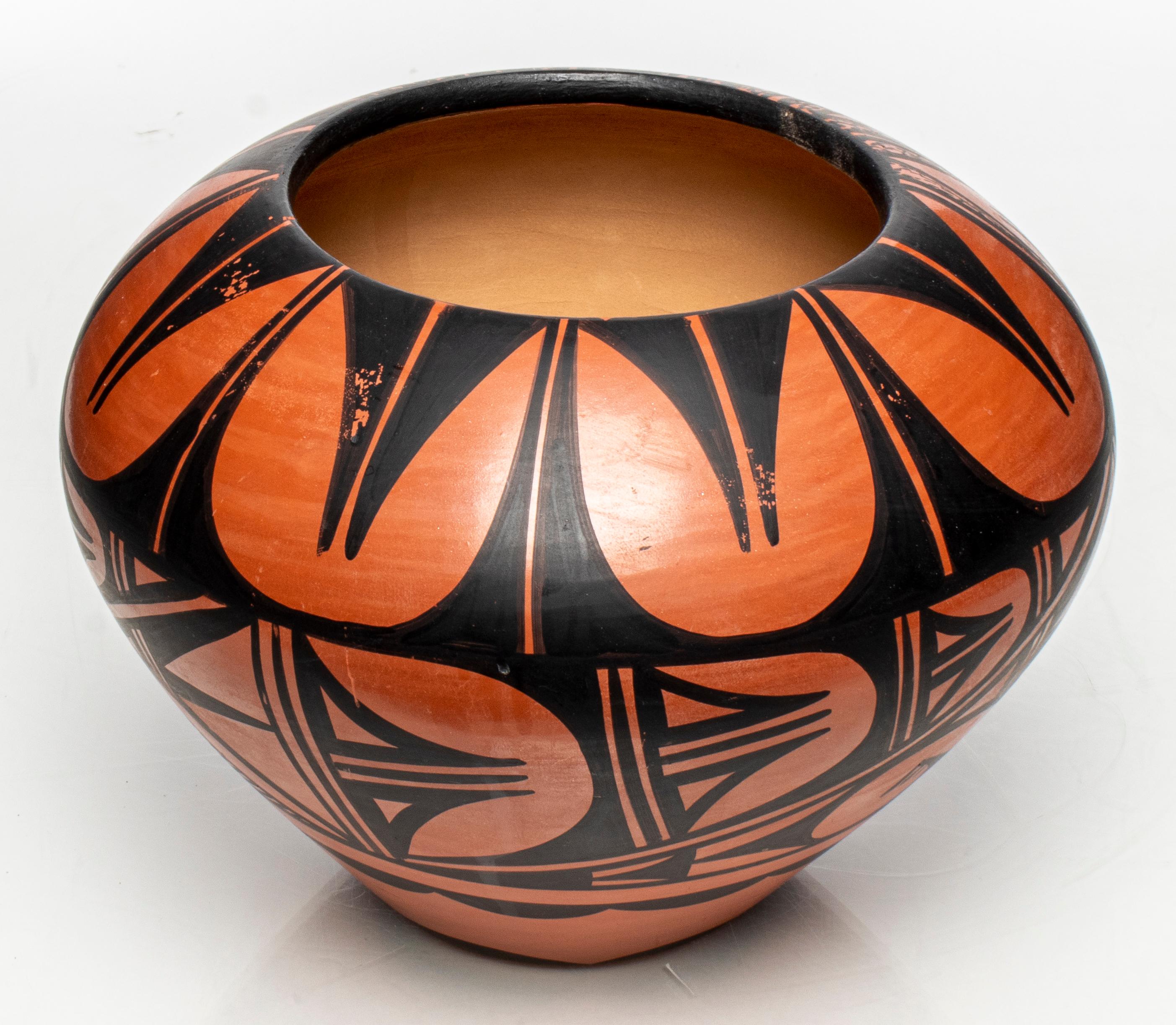 Donald Chinana Jemez Southwest Pueblo pottery vase, signed to base. Measures: 6.75” height x 8.75” diameter.