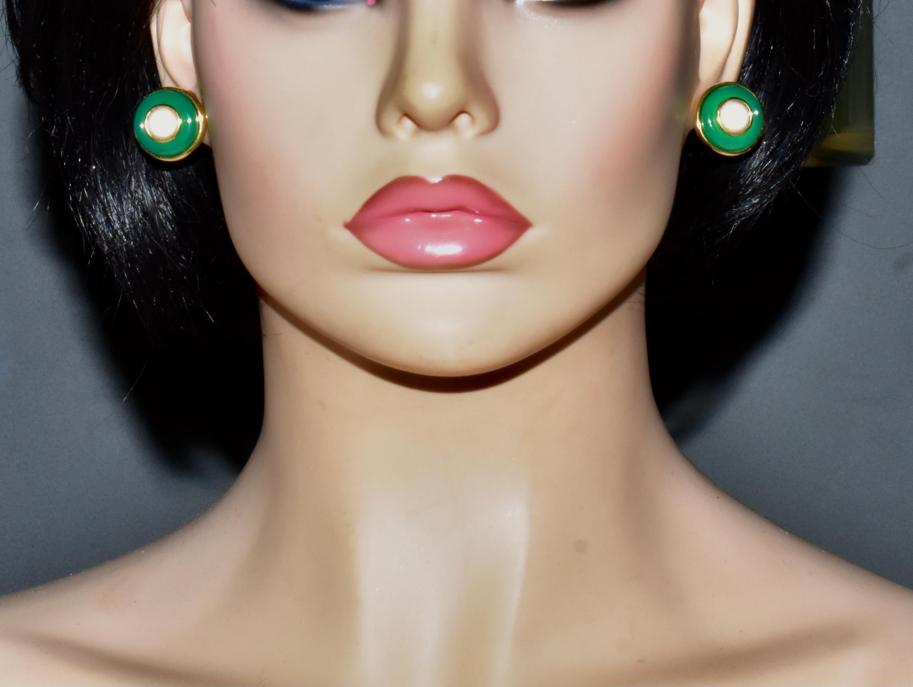  Donald Claflin, an important designer for Tiffany,  designed these earrings in the mid -20th century.  The earrings can be worn three different ways.  The two pair of vintage earrings are both in 18K - one is carnelian  set in 18K yellow gold