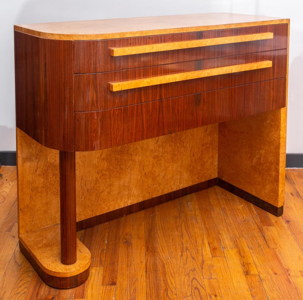 Donald Deskey (American, 1894-1989) Art Deco console sideboard with large drawers in the streamline moderne taste, lacquered burlwood. This piece was designed by Deskey and manufactured by Schmieg, Hungate & Kotzian, Inc. in New York City, circa