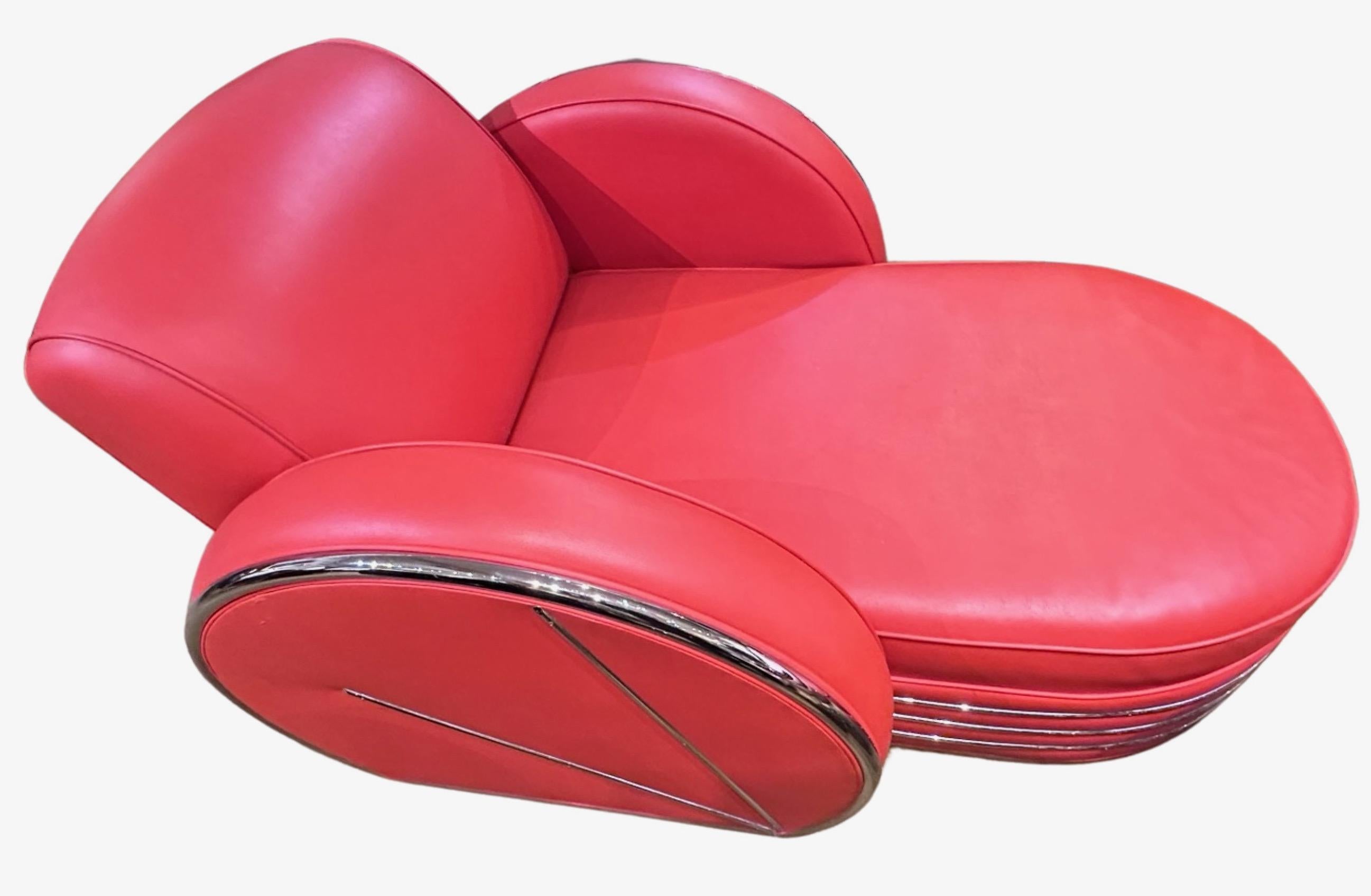 Donald Deskey Design Art Deco Sofa Chaise Lounge. Unique Art Deco streamlined treatment attributed to Deskey as this item was reproduced after the 1930′s probably as late as the 1990s. Hard to find, very high quality, red leatherette, chromed metal,