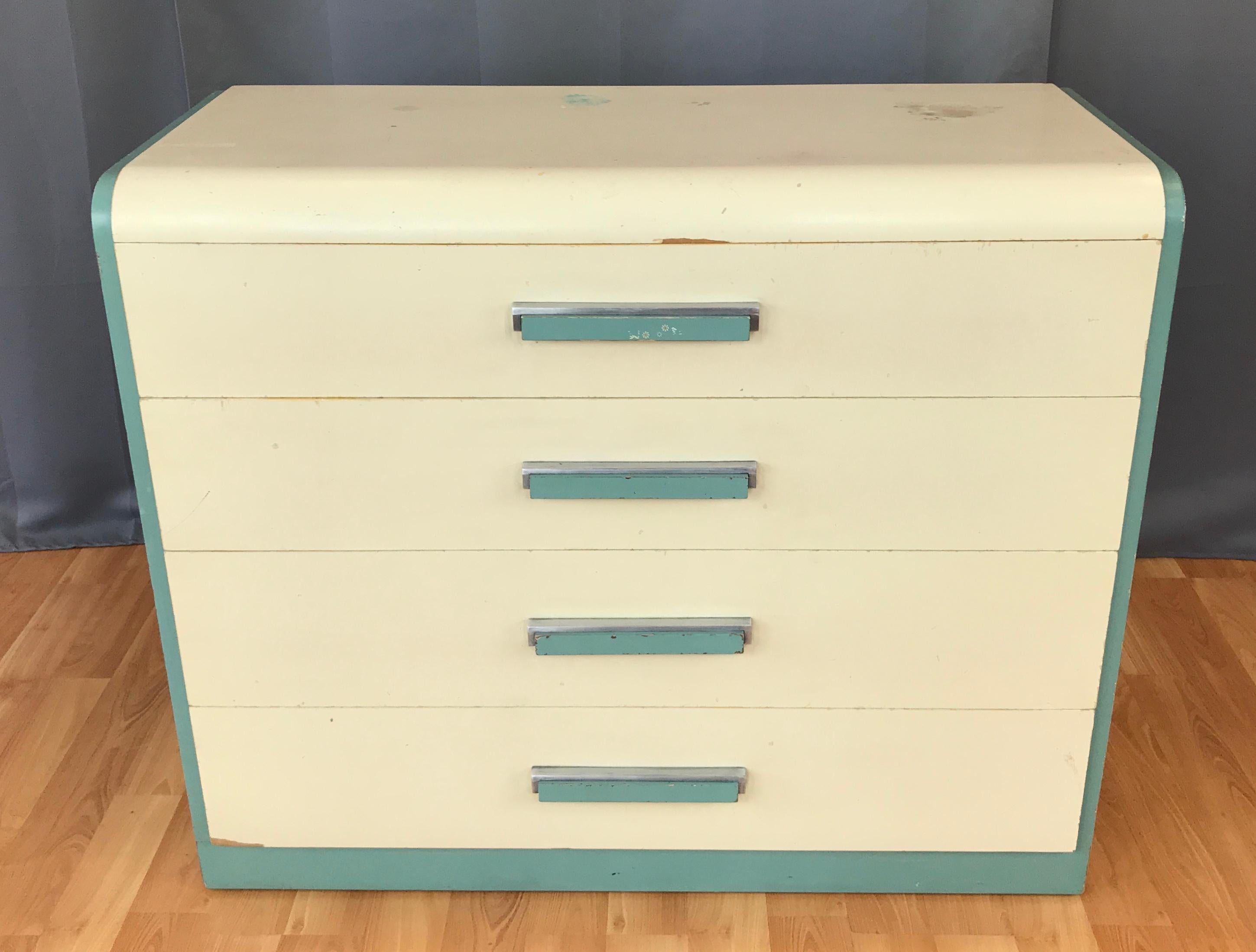 Offered here is a circa 1930s dresser designed by Donald Deskey for Widdicomb Furniture Company of Grand Rapids.

In its original paint color. This example evokes streamliner feel of the high Art Deco style with nautical celadon green and white