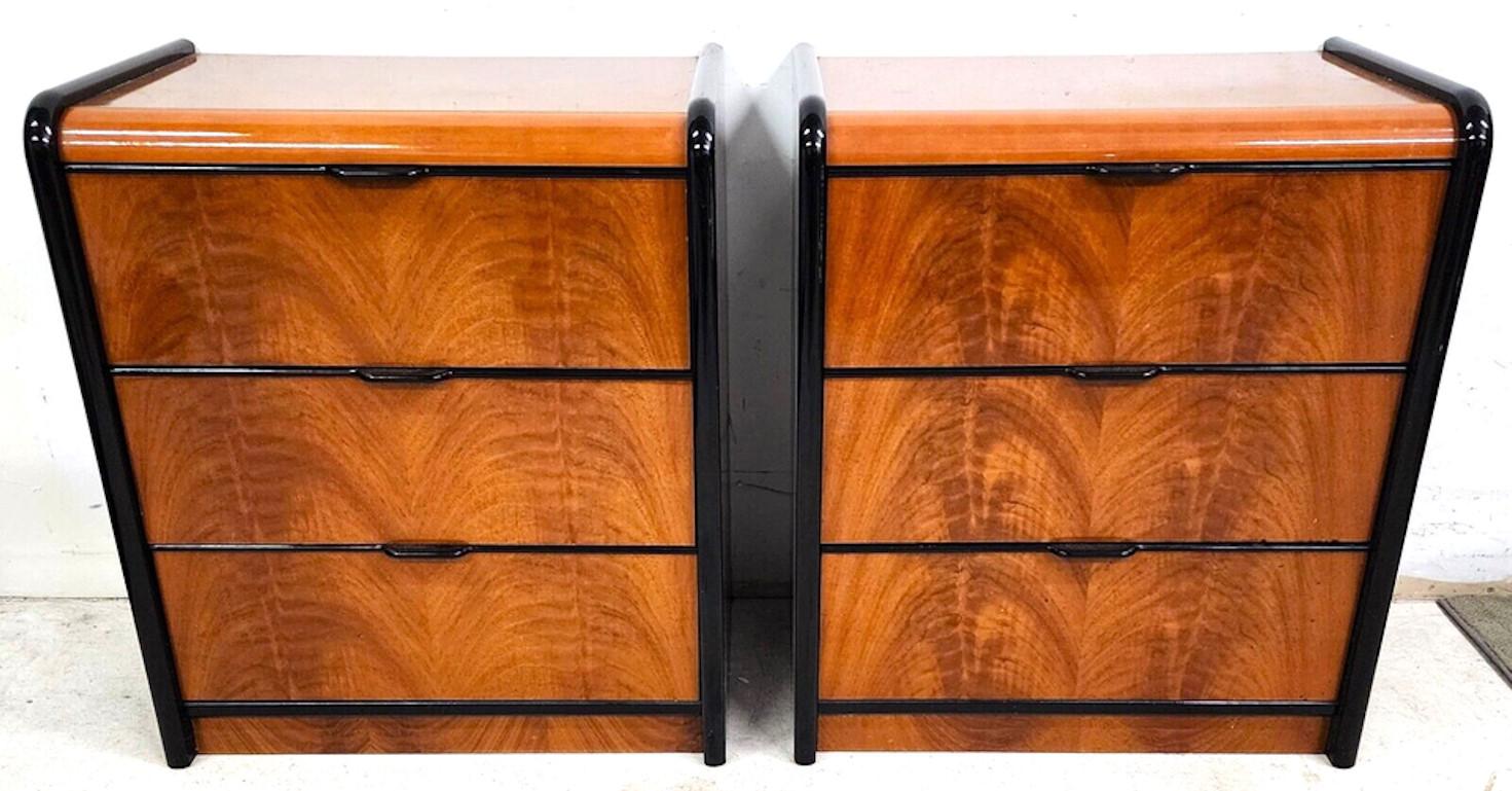 For FULL item description click on CONTINUE READING at the bottom of this page.

Offering One Of Our Recent Palm Beach Estate Fine Furniture Acquisitions Of A
Pair of Donald Deskey Style Italian Nightstands
Featuring a highly polished flame mahogany