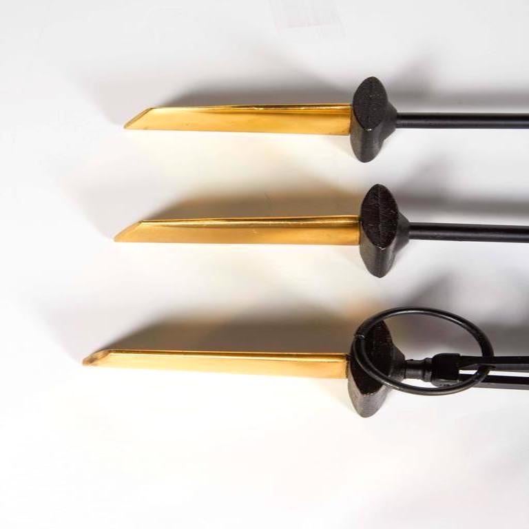Mid-Century Modern Donald Deskey Wall Mounted Fireplace Tools in Brass and Black Iron, c. 1950's